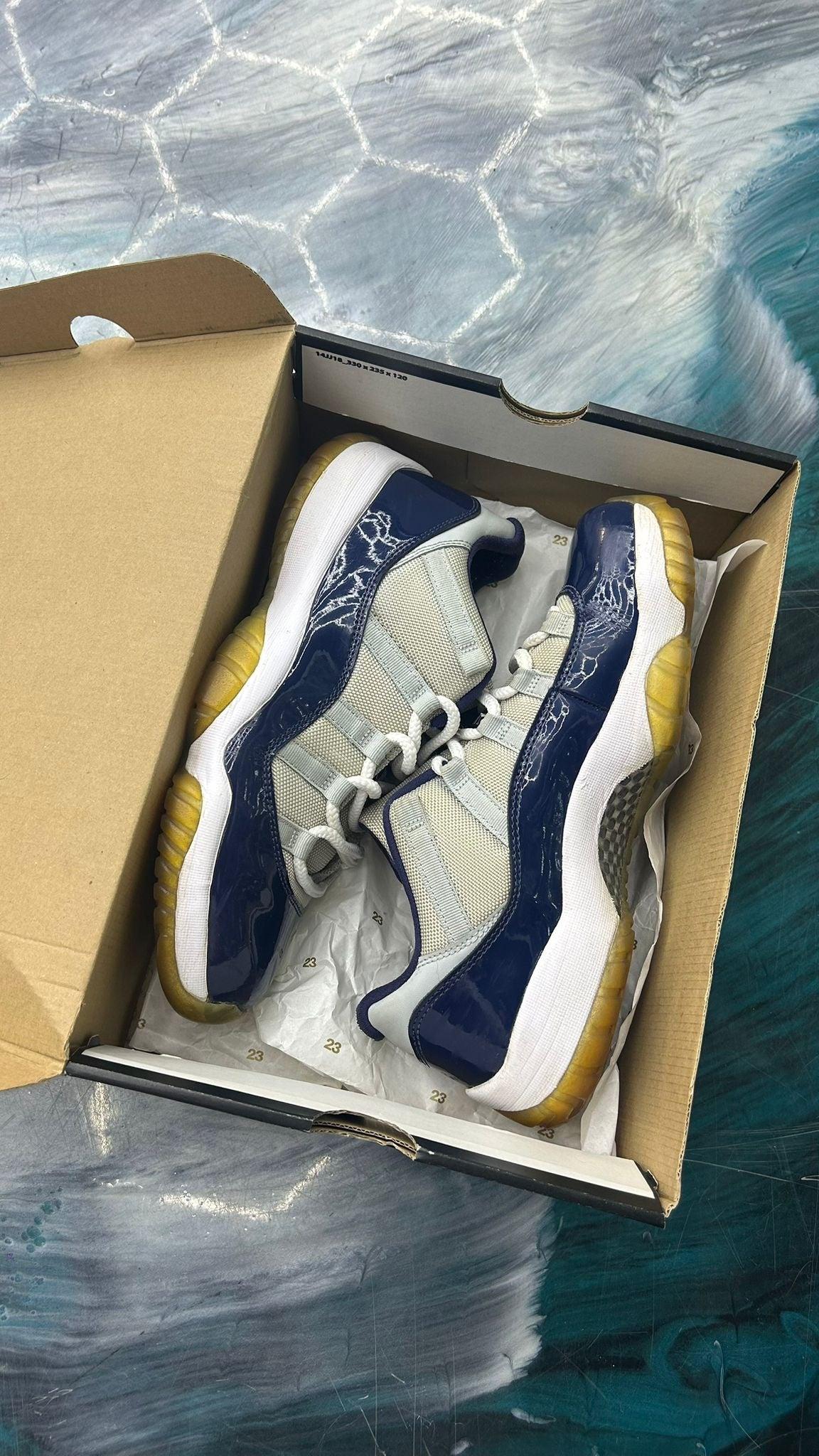 Pre-owned Jordan 11 Retro Low Georgetown size 9.5, navy blue patent leather with grey mesh and white soles in box.