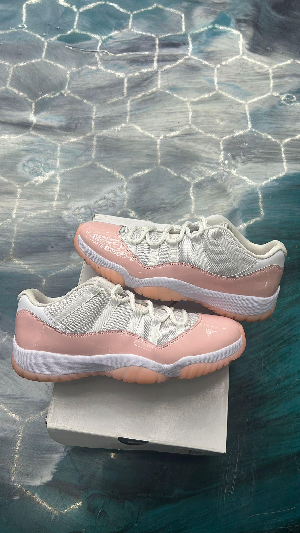 JORDAN 11 Retro Low Legend Pink (Womens) size 10.5M, white mesh and patent pink leather sneakers.