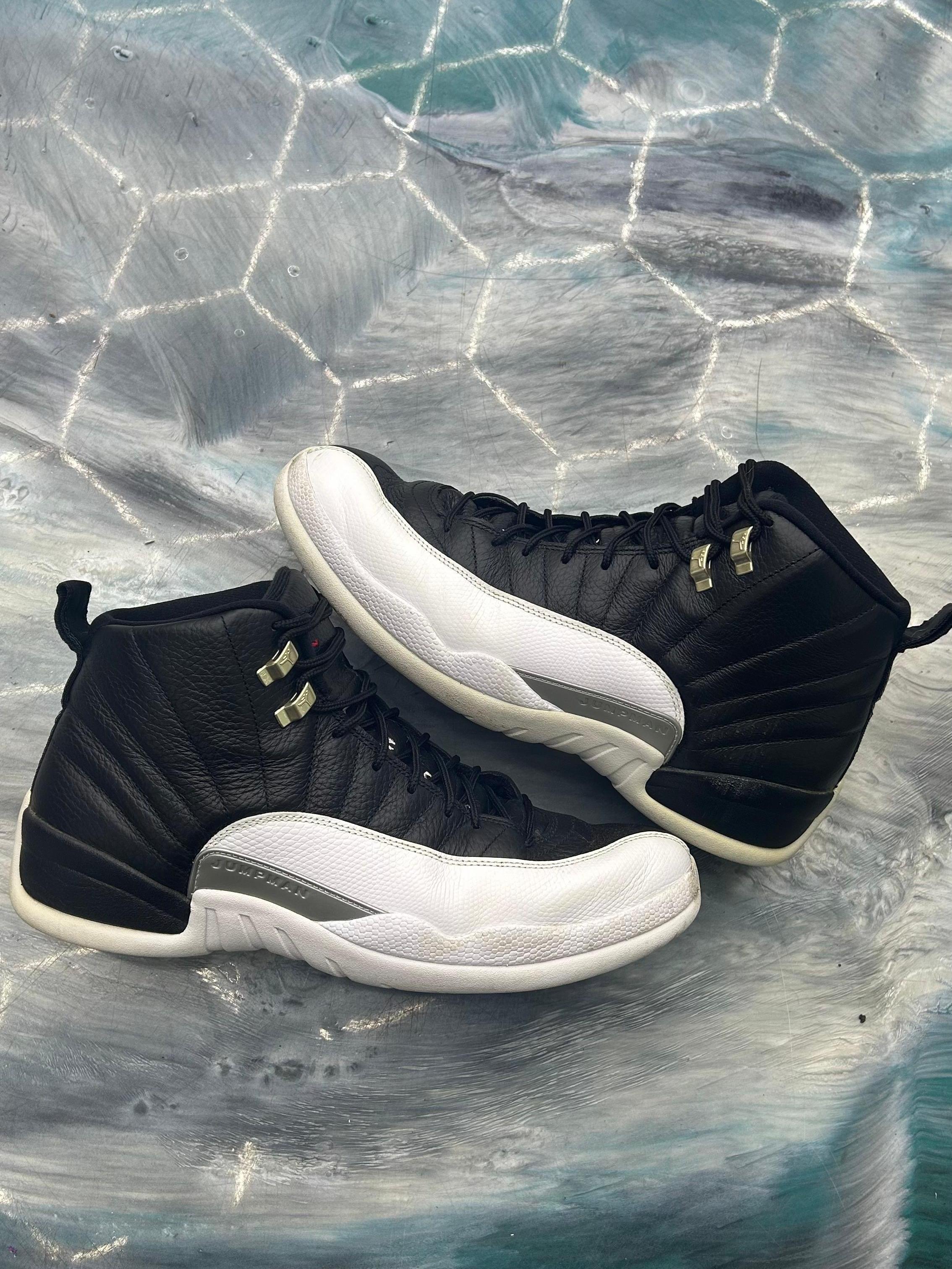 Pre-owned Jordan 12 Retro Playoff (2022) size 13 sneakers, black leather upper with white mudguard.