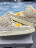 Pre-owned Jordan 2 Retro SP Union Rattan sneakers, size 7, with light grey suede, cream canvas, and yellow accents.
