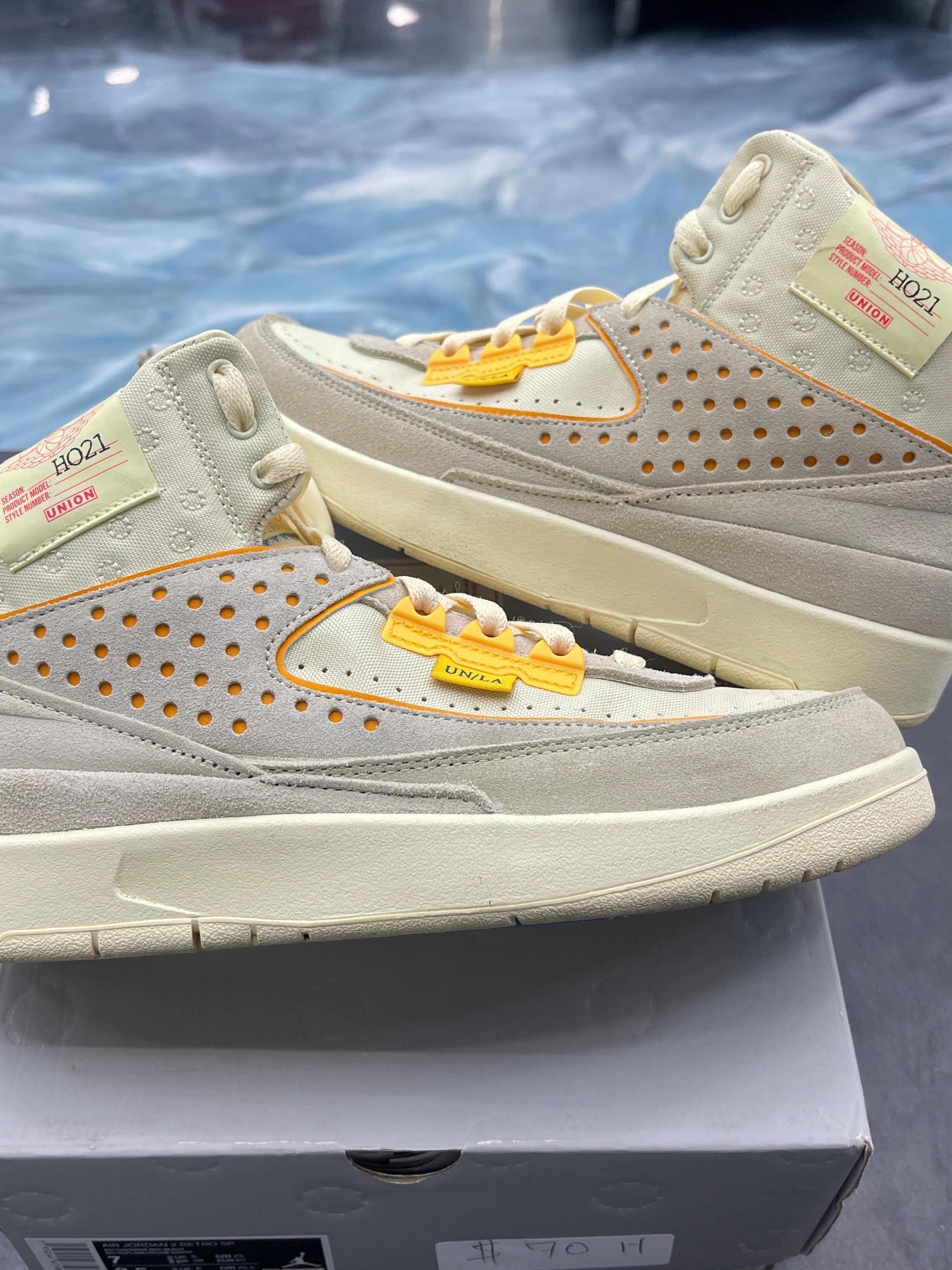 Pre-owned Jordan 2 Retro SP Union Rattan sneakers, size 7, with light grey suede, cream canvas, and yellow accents.