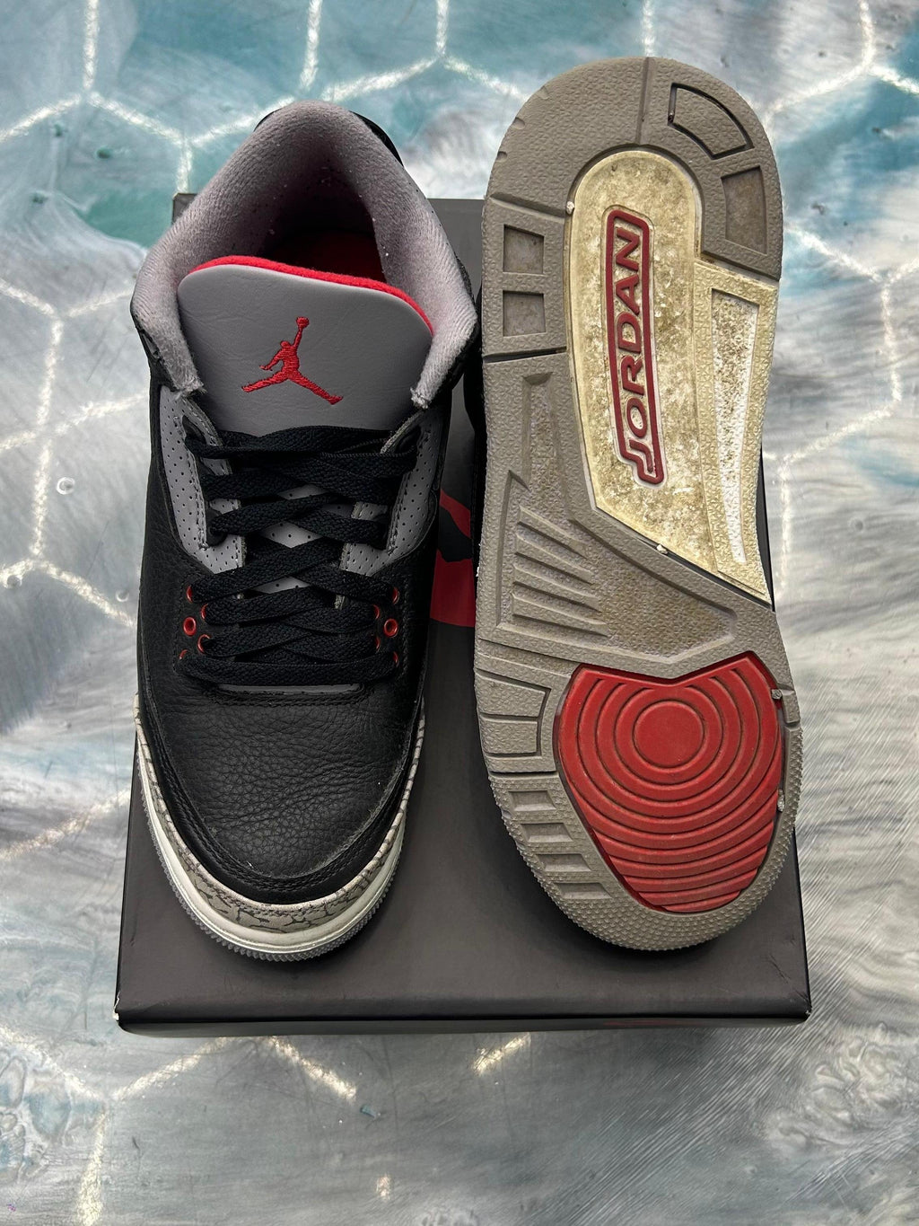 Pre-owned JORDAN 3 RETRO Black Cement sneakers, size 7Y, showing worn soles and red Jumpman logo.