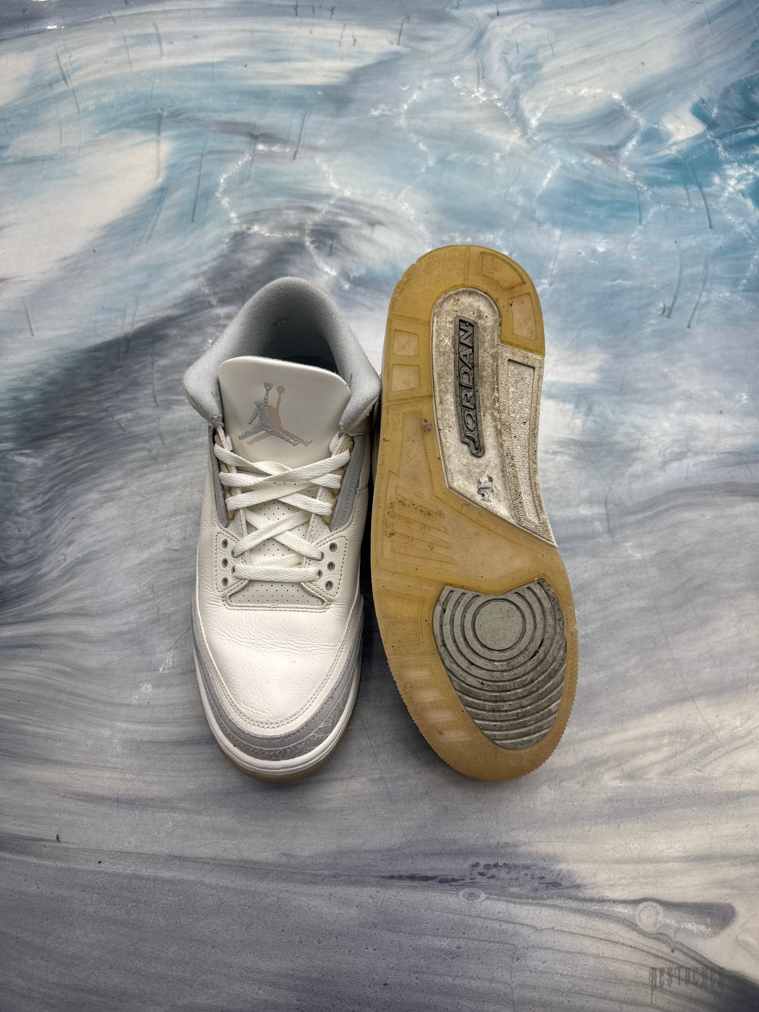 Pre-owned Jordan 3 Retro Craft Ivory size 11.5 sneaker, white leather with grey accents, next to its dirty tan sole.