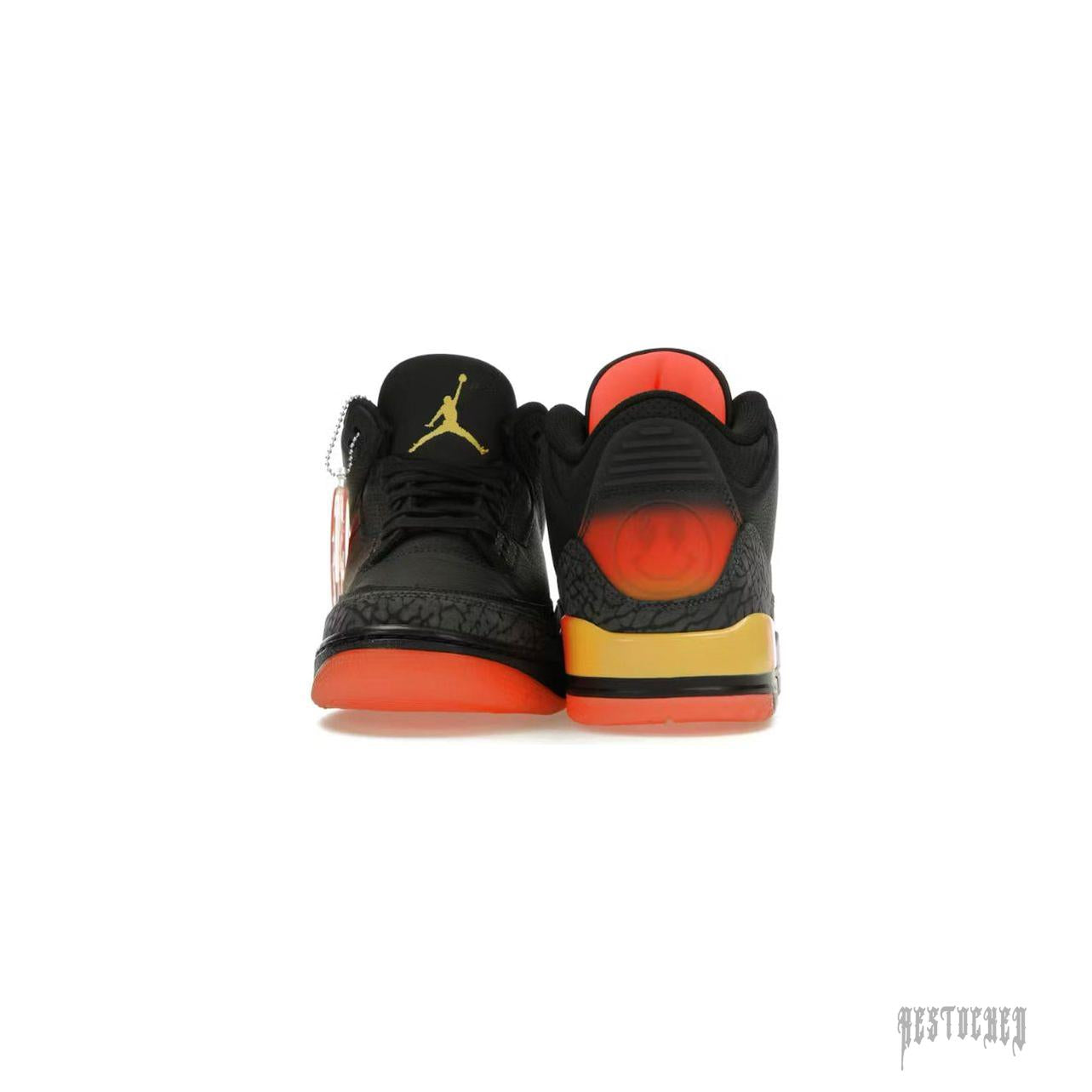 JORDAN 3 RETRO J BALVIN RIO sneakers, black leather with grey elephant print, vibrant orange and yellow accents, J Balvin smiley logo.