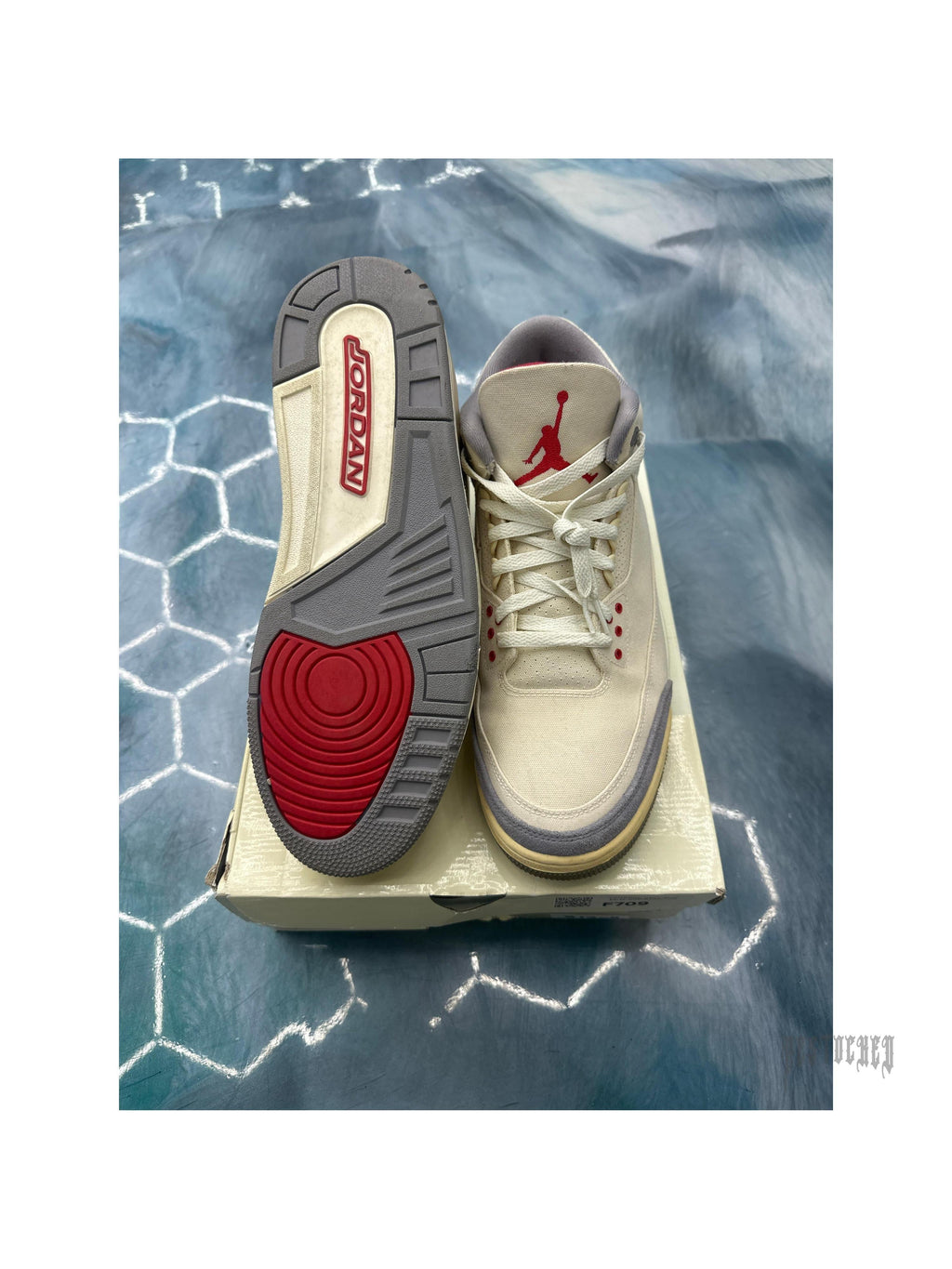 Pre-owned Jordan 3 Retro Muslin size 13 sneaker with cream upper, red Jumpman, and gray/red sole.