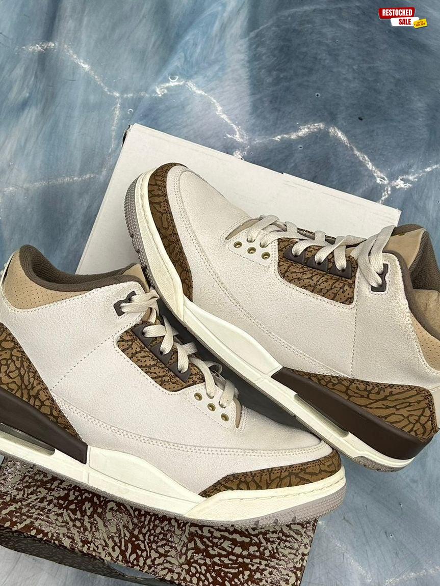 Pre-owned Jordan 3 Retro Palomino sneakers, size 9.5, in off-white with brown elephant print accents.