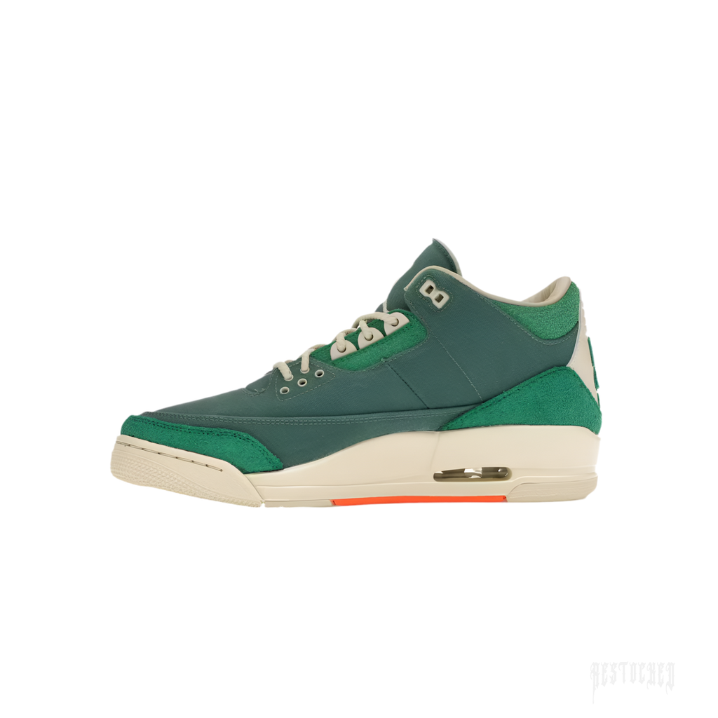 JORDAN 3 RETRO SP Nina Chanel Abney Bicoastal sneaker, dark green leather with light green suede accents, cream sole, and orange detail.