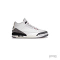 JORDAN 3 Retro White Cement Reimagined sneaker with white leather, gray elephant print, and pre-aged cream midsoles.