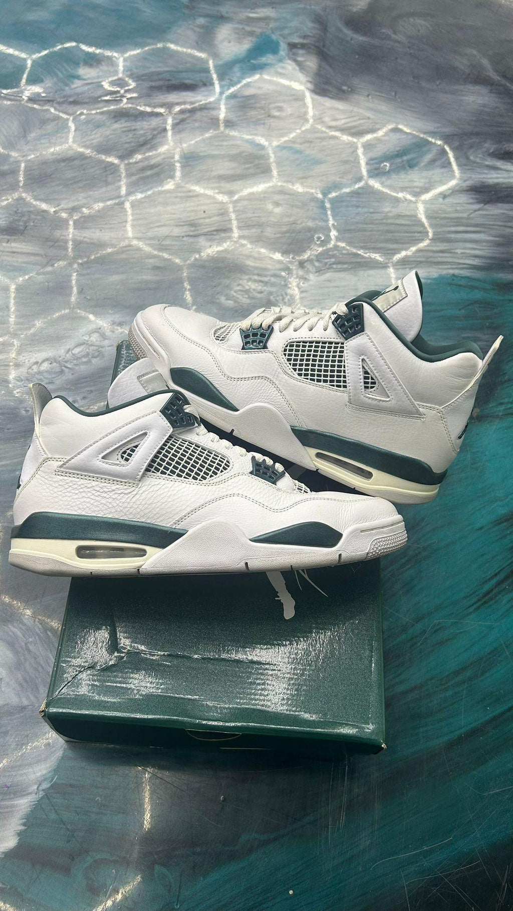 Pre-owned Jordan 4 Oxidized Green sneakers, size 11, with white leather uppers and dark green accents.