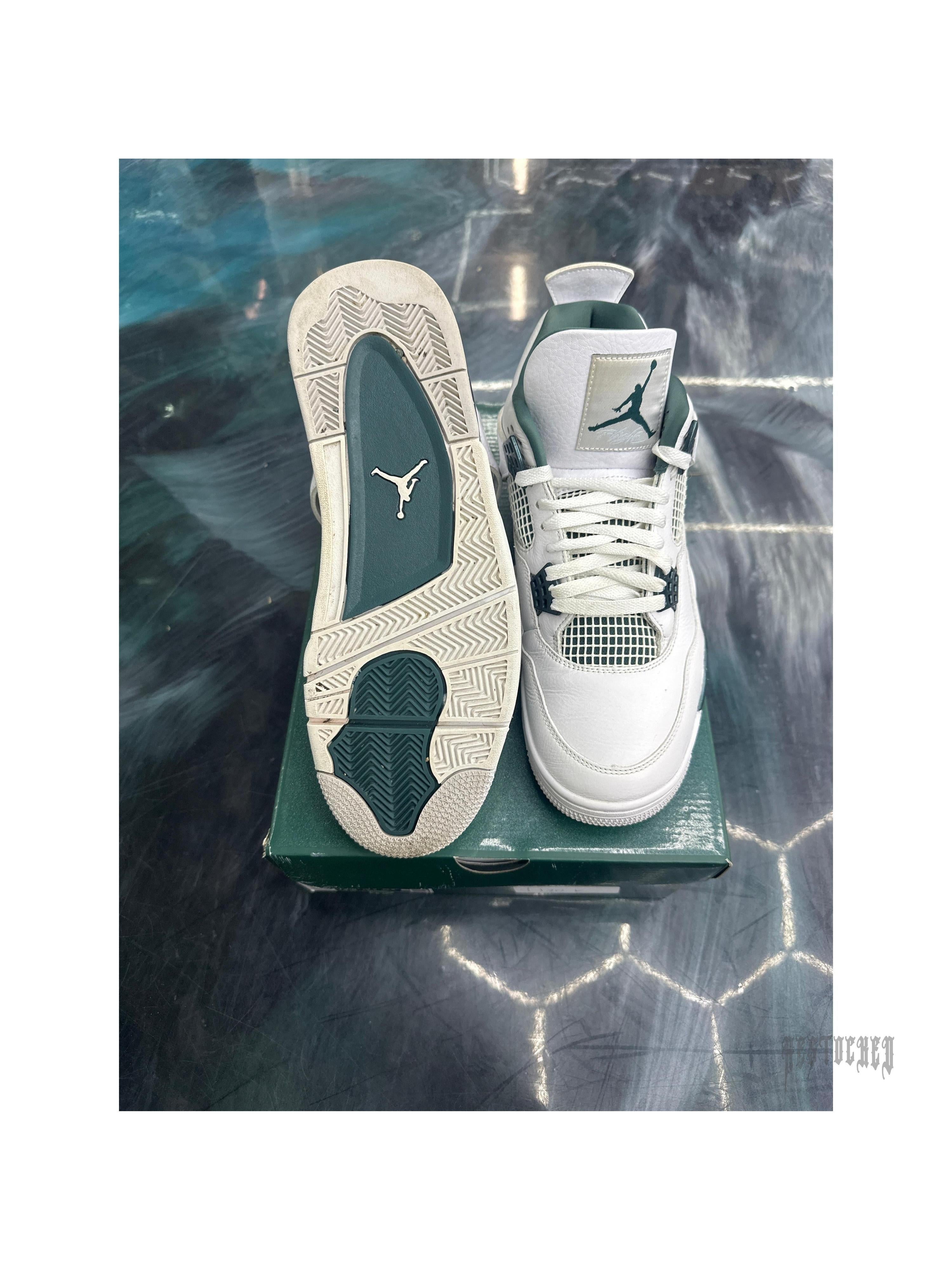 Pre-owned Jordan 4 Oxidized Green sneakers, size 12, white leather with green accents and Jumpman logo.