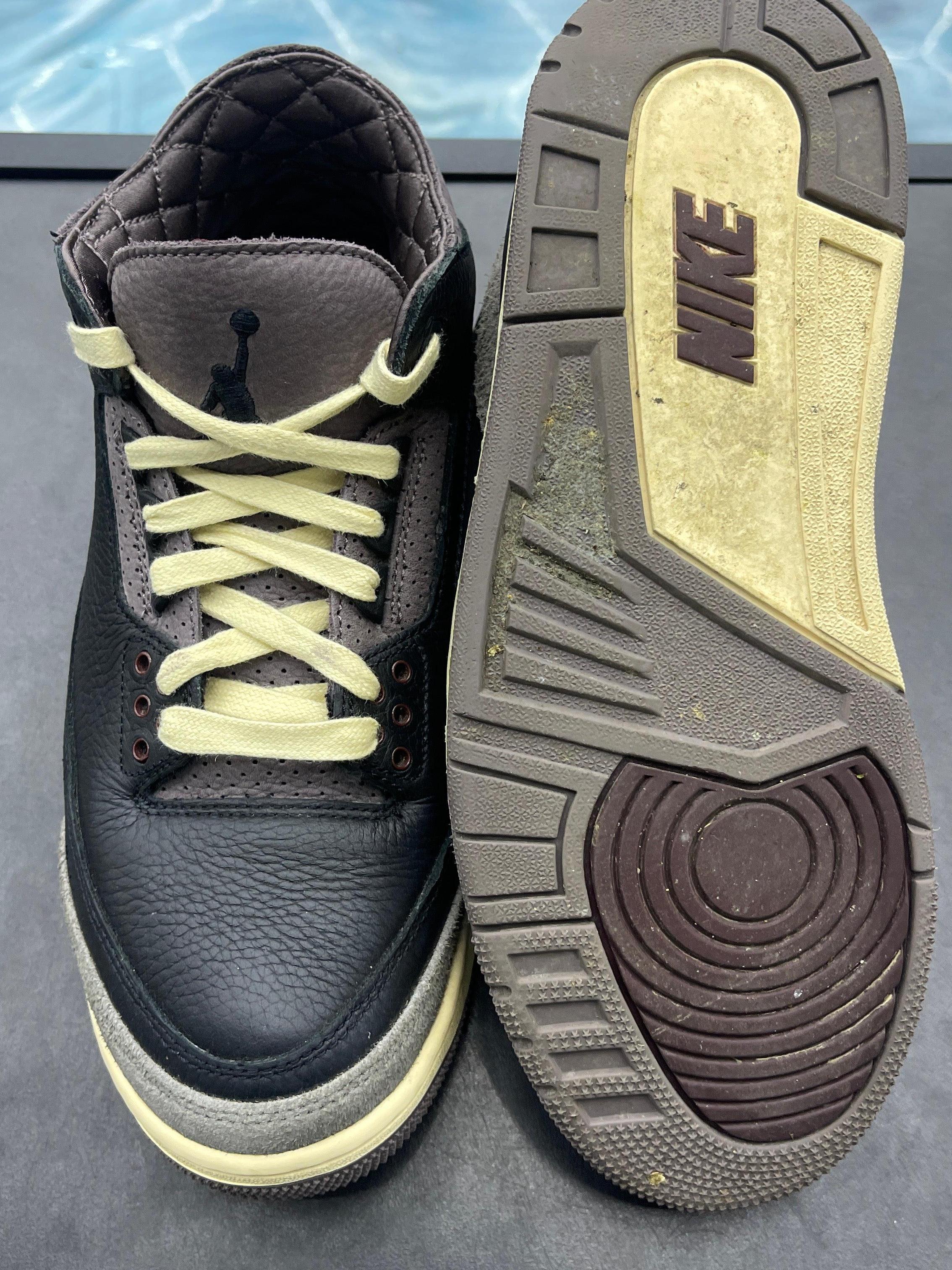 Pre-owned Jordan 4 Retro A Ma Maniere, black leather with grey accents, yellow laces, and visible sole wear.