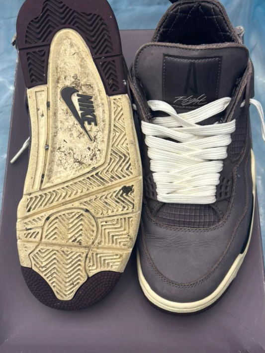 Pre-owned JORDAN 4 RETRO A MA MANIERE SIZE 7, dark grey leather with white laces, visible worn sole.