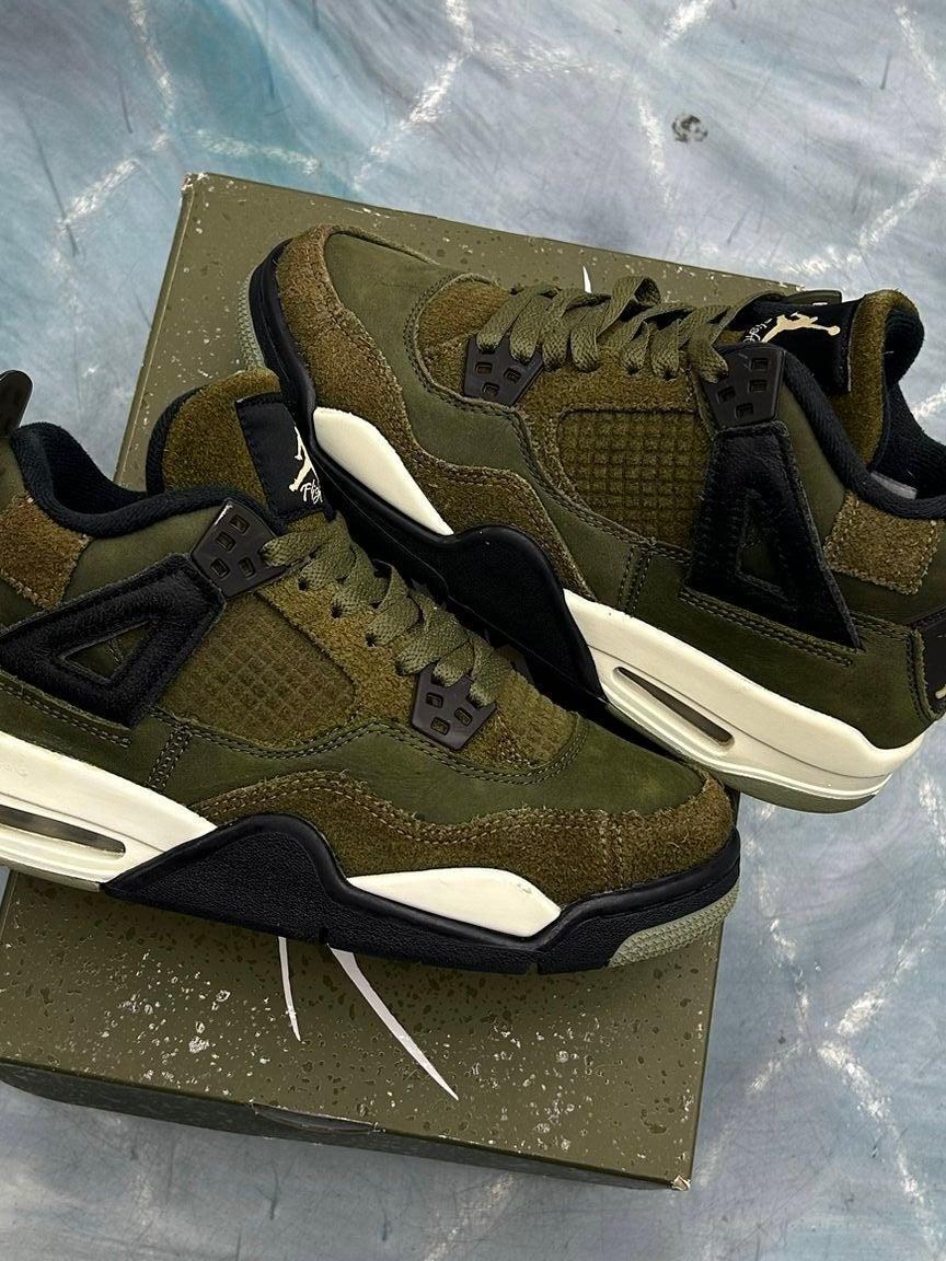 JORDAN 4 RETRO CRAFT MEDIUM OLIVE PRE OWNED SIZE 5.5Y sneakers with olive suede and mesh, black accents, and white soles.