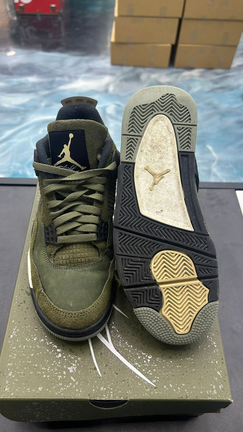 JORDAN 4 Retro Craft Medium Olive sneaker, pre-owned size 8, with green suede and black accents.