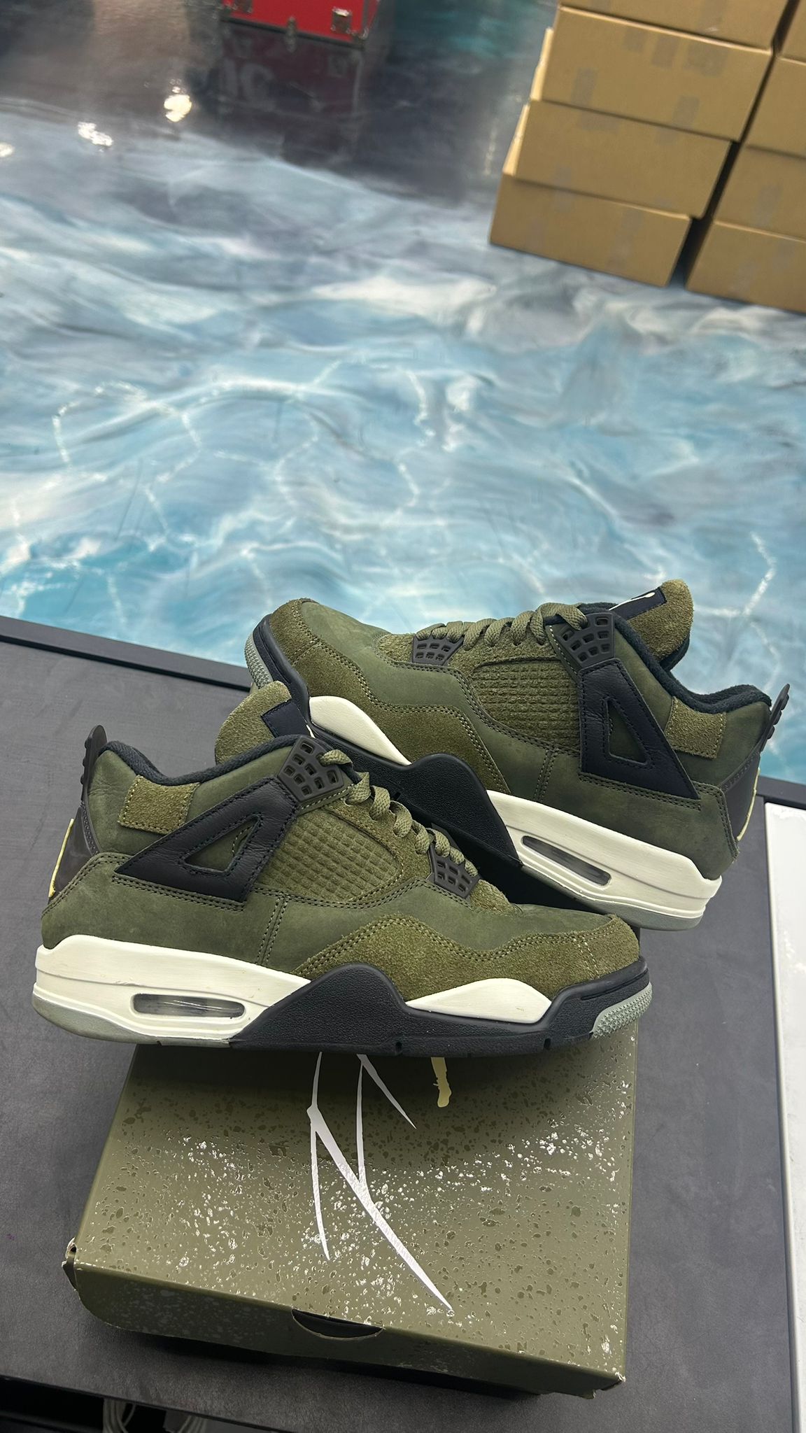 Pre-owned Jordan 4 Retro Craft Medium Olive sneakers, size 8, with black accents and white soles.