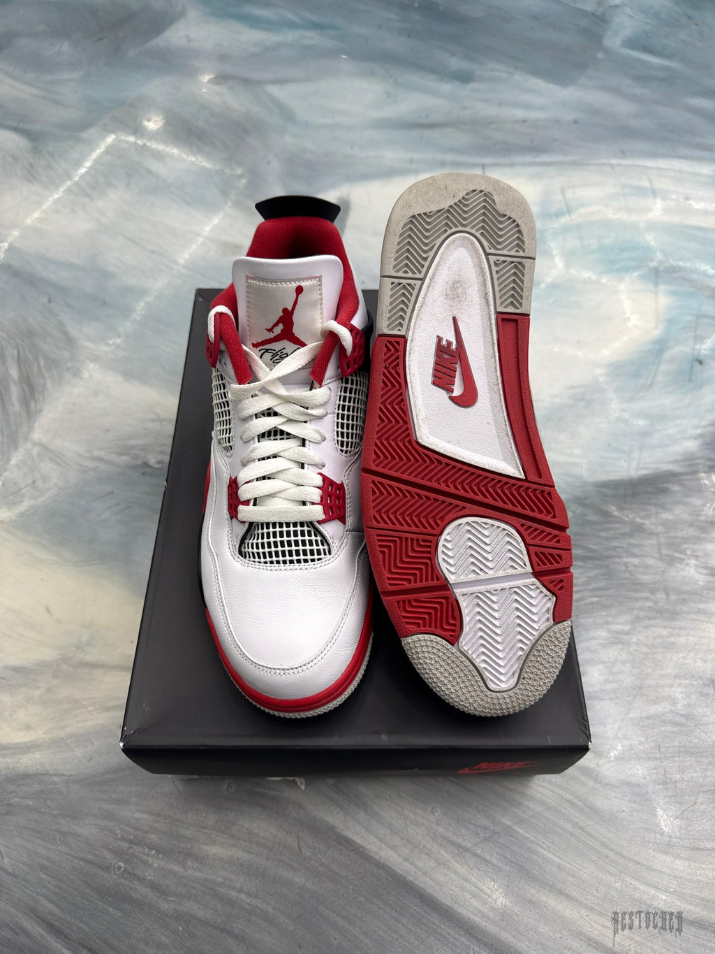 JORDAN 4 RETRO FIRE RED (2020) pre-owned size 11, white leather with red accents, black mesh, and red/white sole.