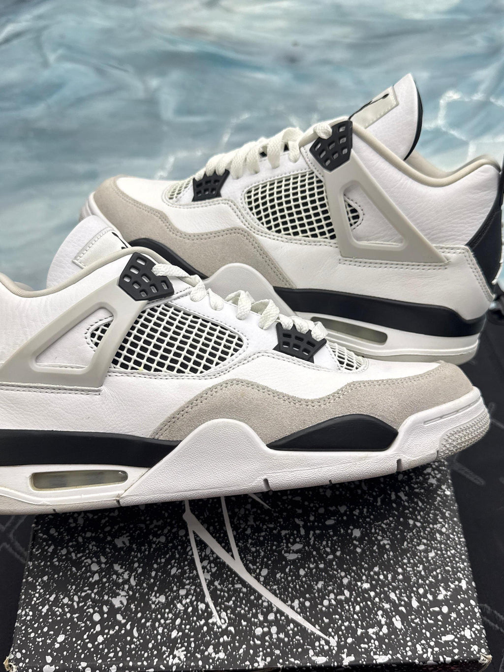 JORDAN 4 RETRO MILITARY BLACK pre-owned size 10 sneakers, white leather with grey suede and black accents.