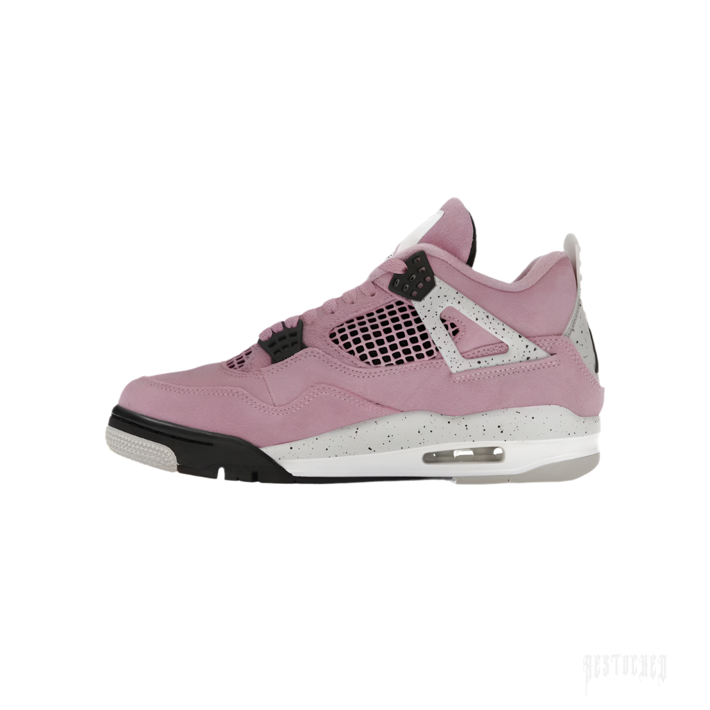 JORDAN 4 RETRO ORCHID women's sneaker in pink suede with black and speckled grey accents.