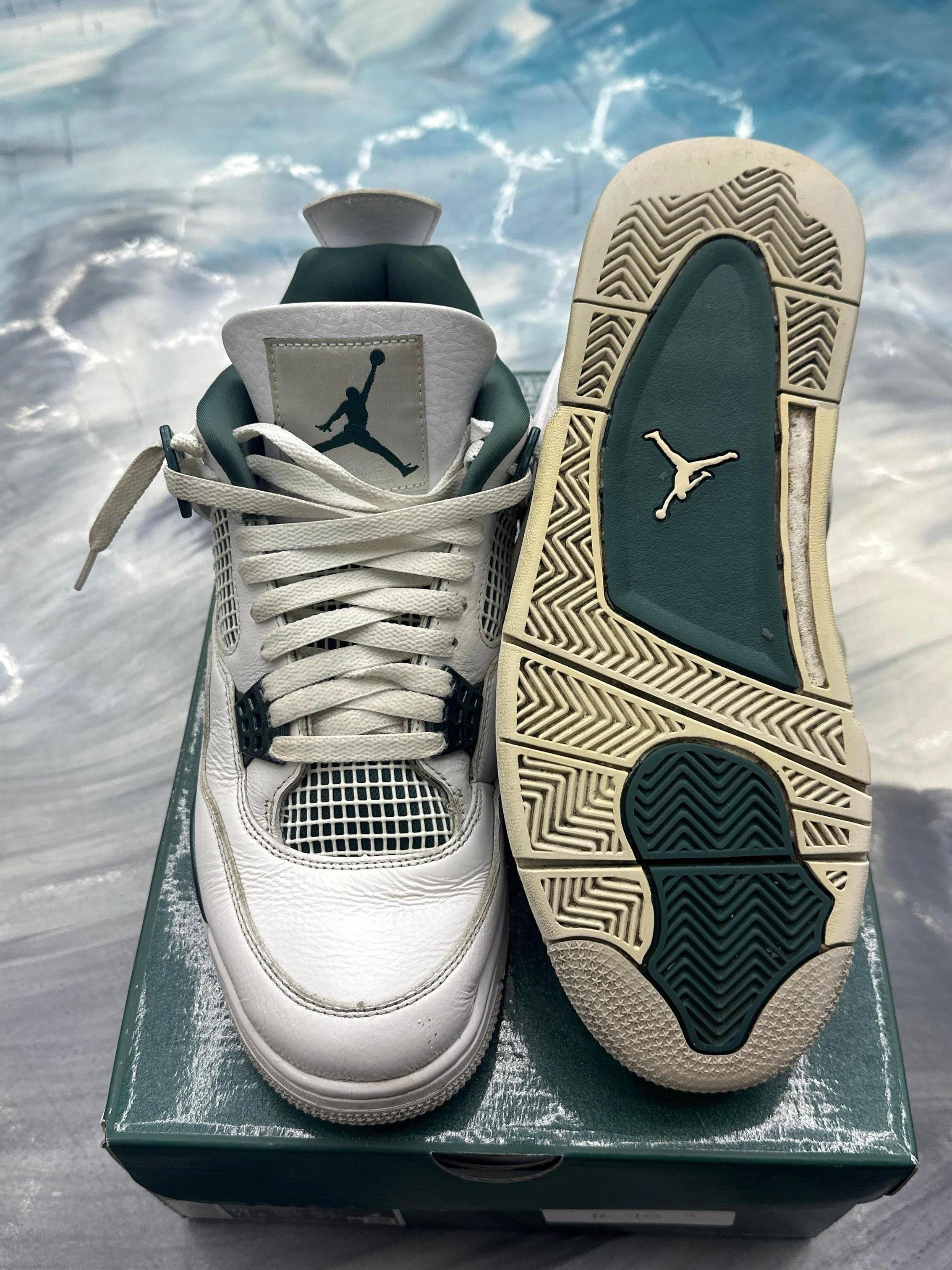Pre-owned Jordan 4 Retro Oxidized Green sneakers, size 10, showing white leather, dark green accents, and Jumpman logos.