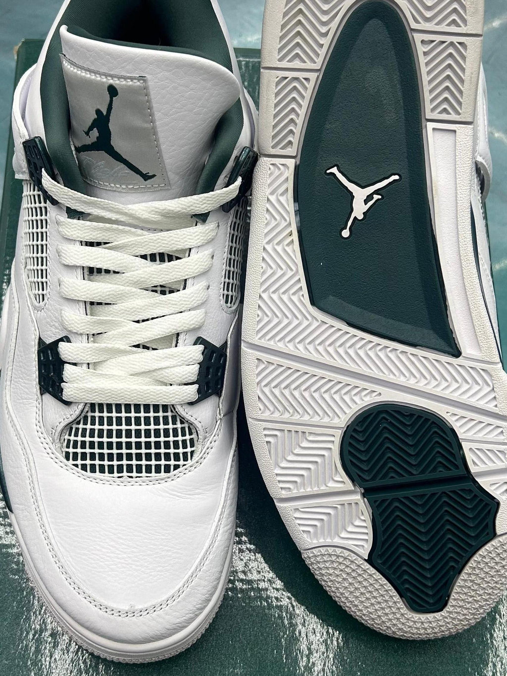 Jordan 4 Retro Oxidized Green pre-owned size 12, white leather with dark green accents.