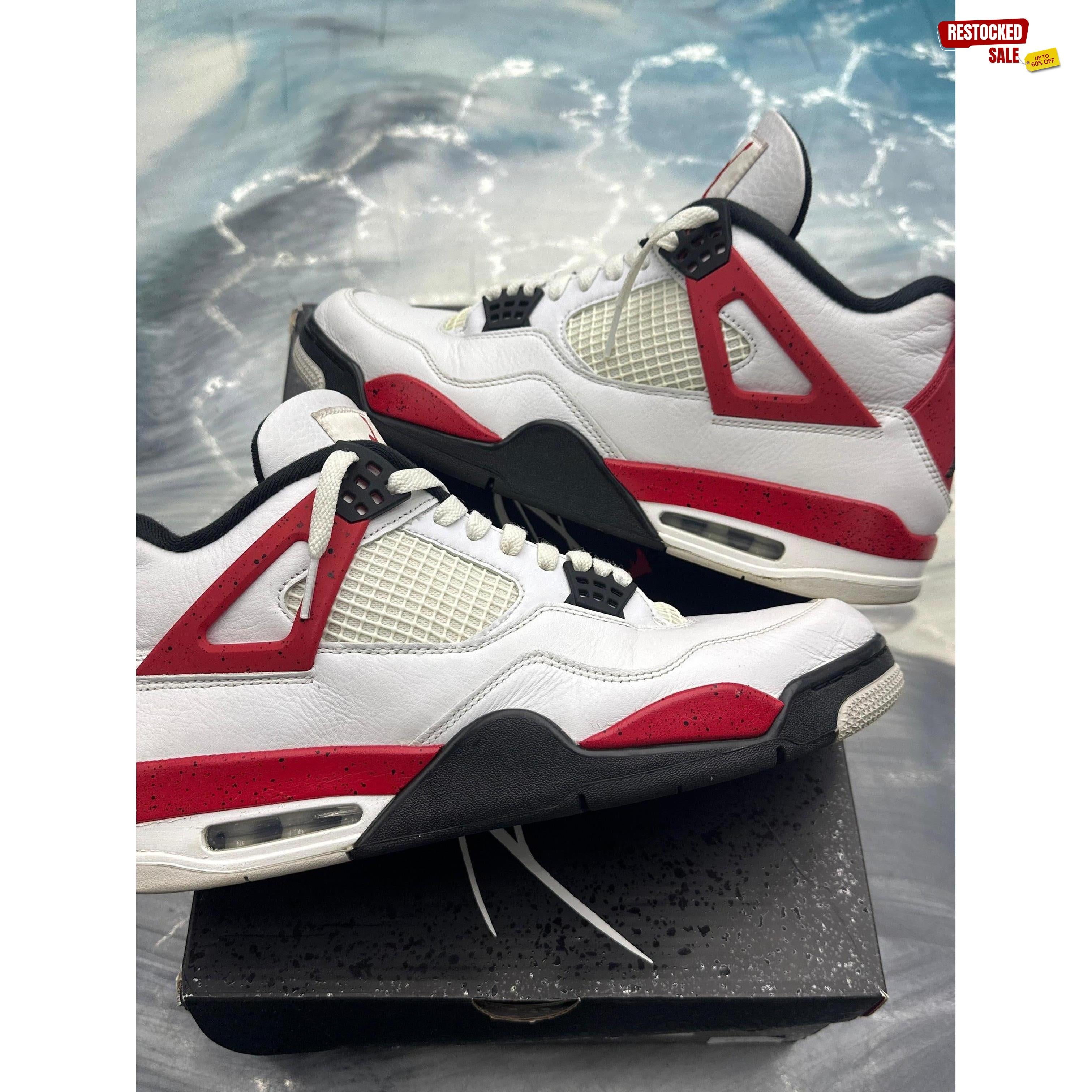 JORDAN 4 RETRO RED CEMENT pre-owned size 12 sneakers, white leather with red and black accents.