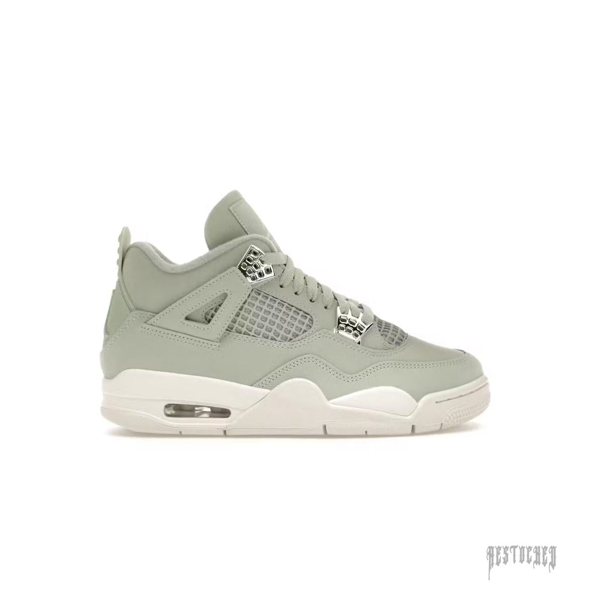 JORDAN 4 RETRO SEAFOAM SAIL (WOMENS) sneaker, light green leather upper, white sole, visible air unit.