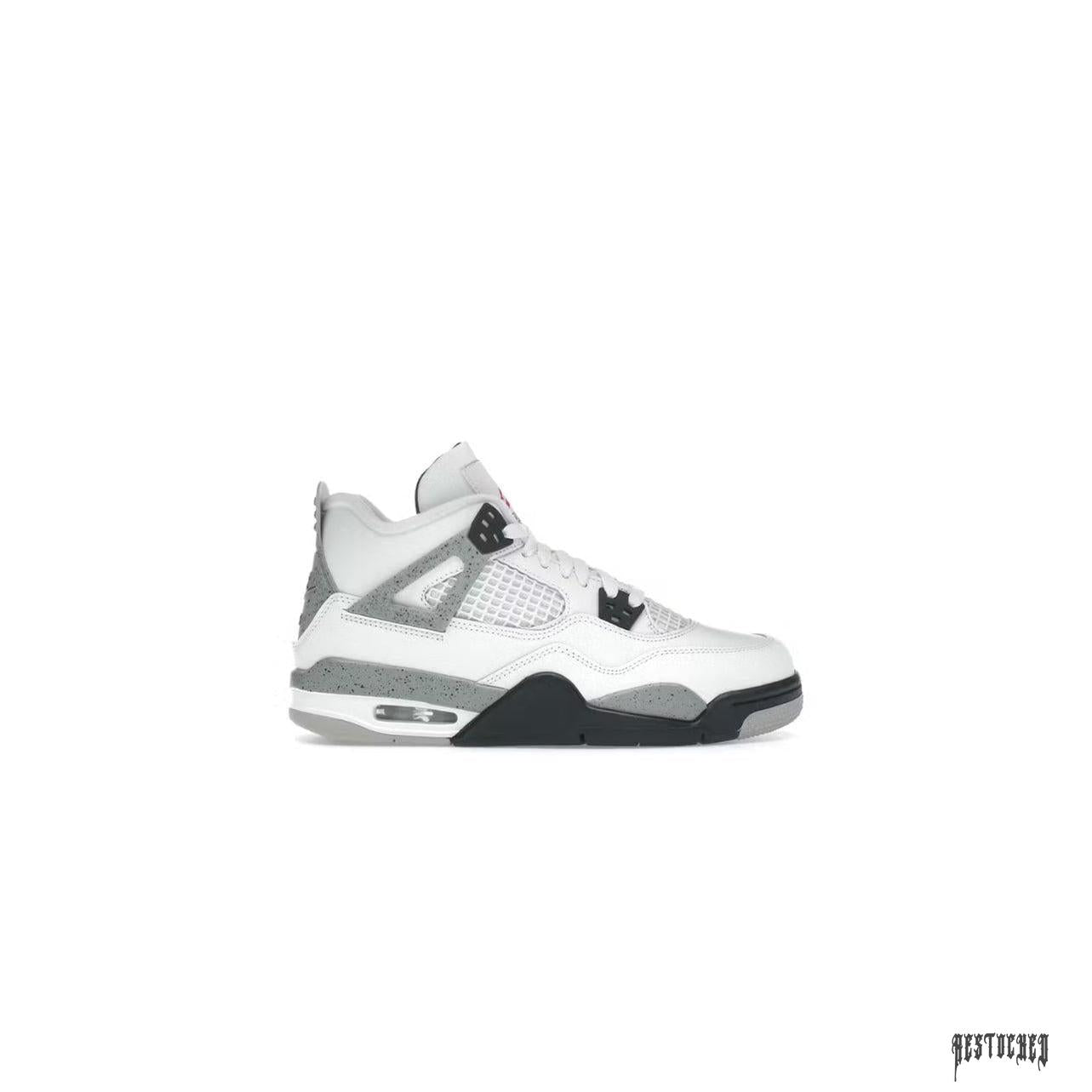 JORDAN 4 RETRO WHITE CEMENT (GS) sneaker with white leather, grey speckled accents, and black sole.