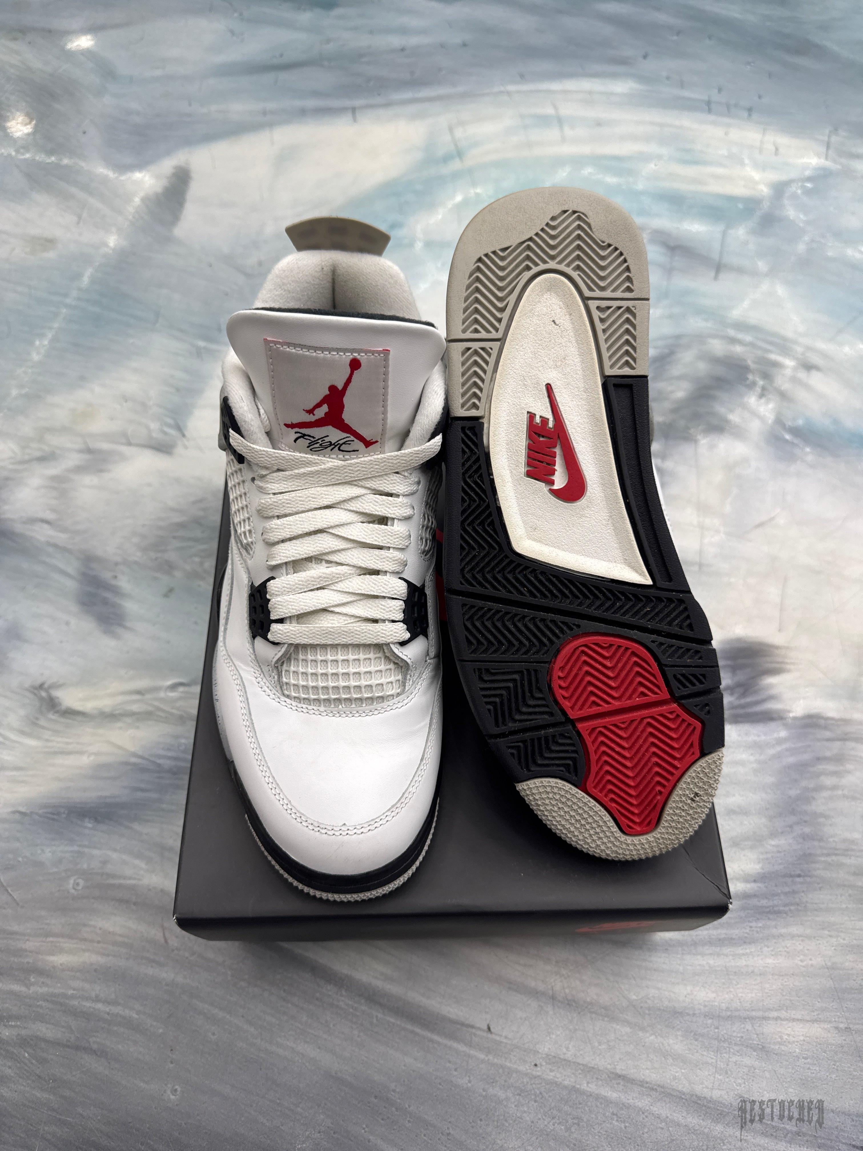 JORDAN 4 Retro White Cement pre-owned size 9, white leather with red Jumpman and black accents.