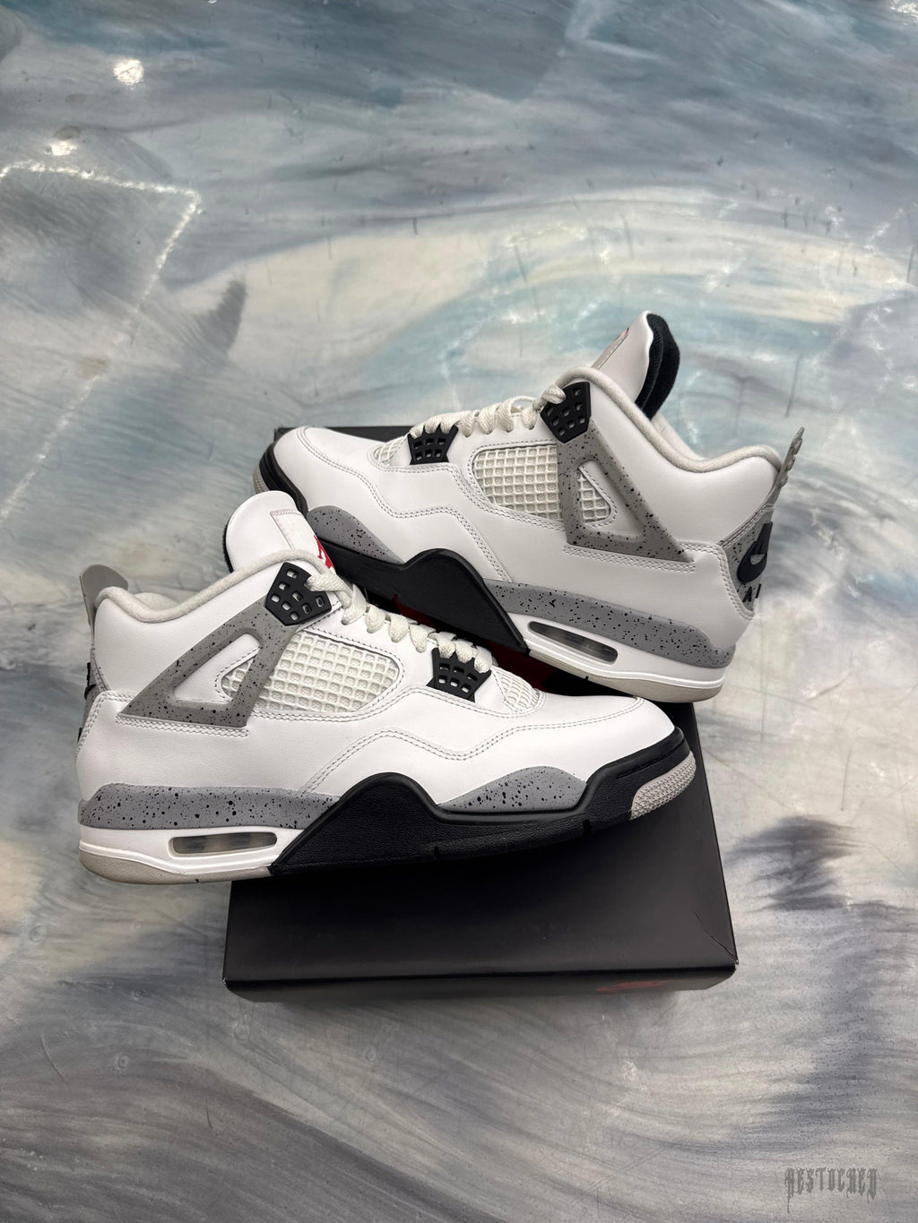 Pre-owned Jordan 4 Retro White Cement sneakers, size 9, with white leather, grey speckled accents, and black soles.