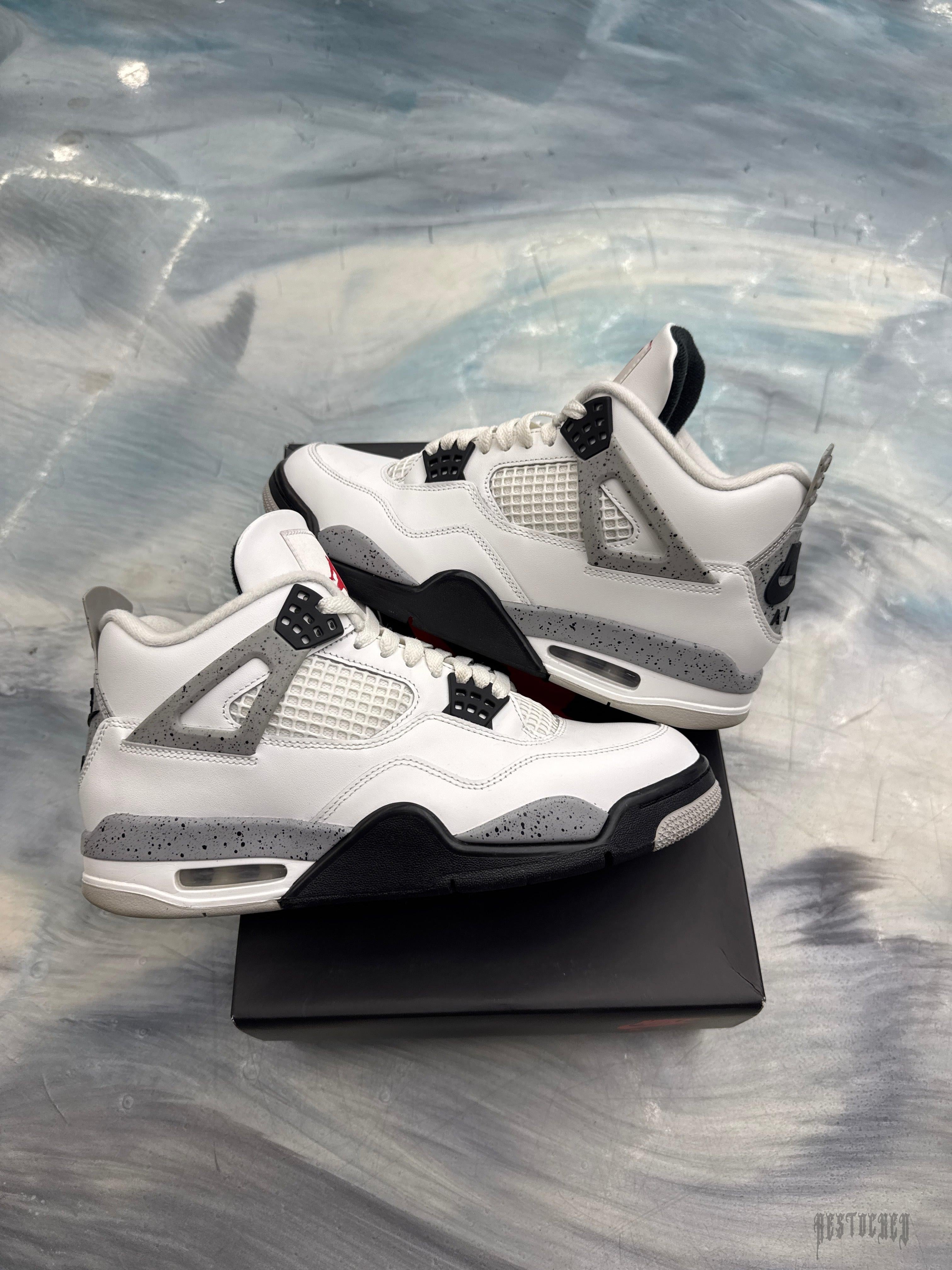 Pre-owned Jordan 4 Retro White Cement sneakers, size 9, with white leather, grey speckled accents, and black soles.