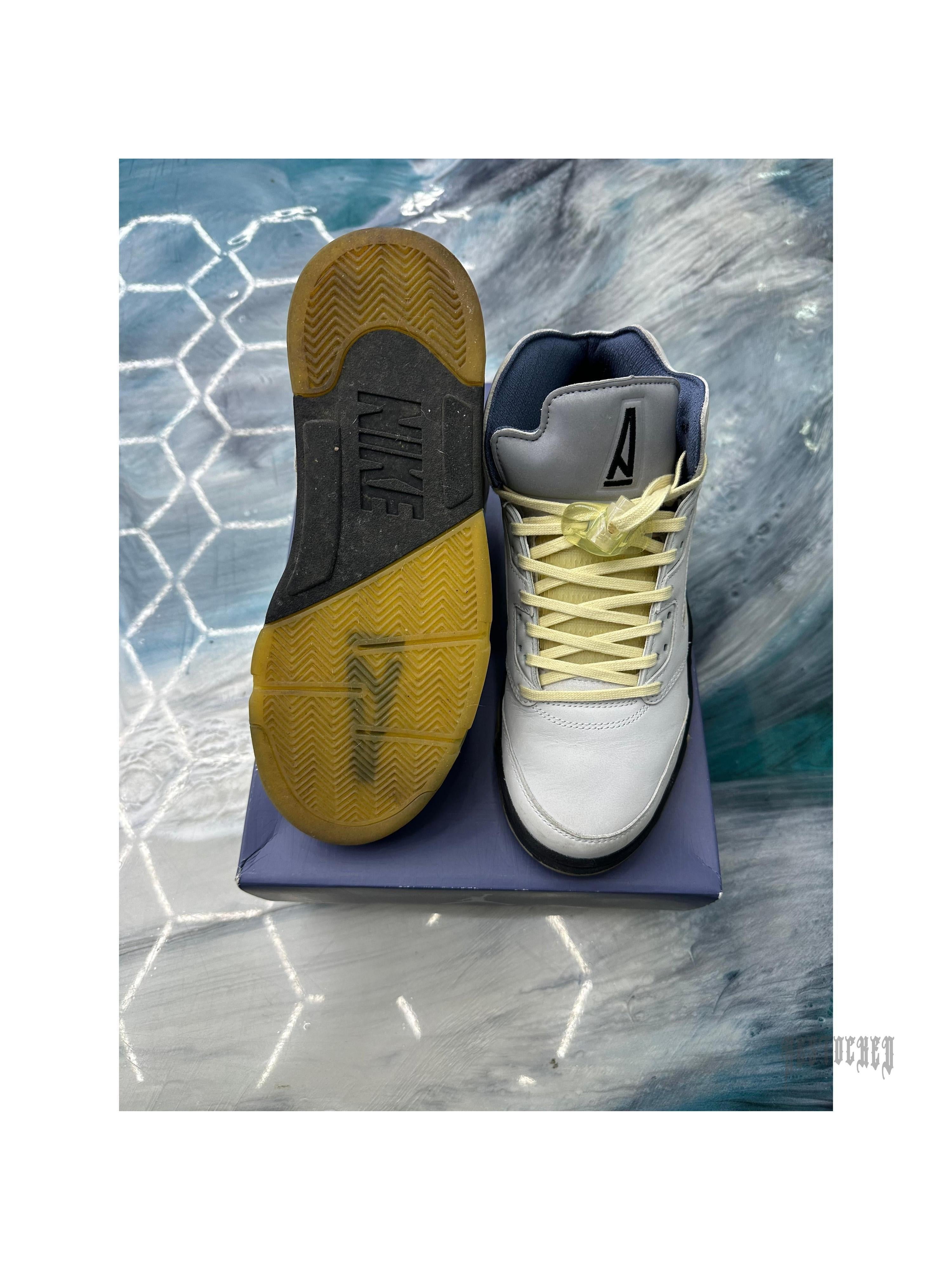JORDAN 5 RETRO A MA MANIERE DAWN pre-owned sneakers, light grey with yellow laces, black and yellow sole.