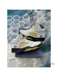 Pre-owned Jordan 5 Retro A Ma Maniere Dawn sneakers, size 13.5W/12M, white leather with yellow accents and "23" embroidery.