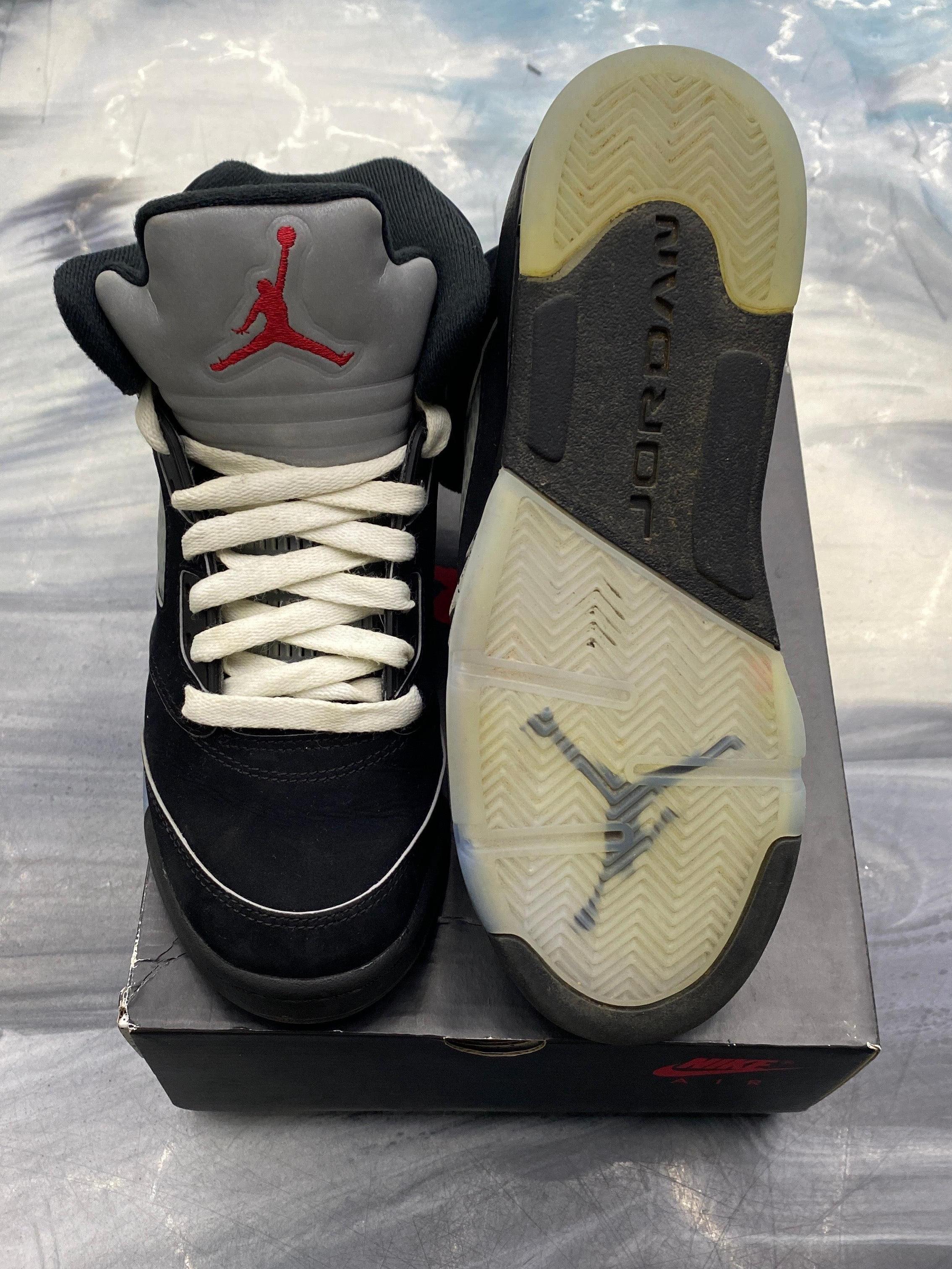 Pre-owned Jordan 5 Retro Black Metallic size 6.5Y, black suede upper, grey tongue with red Jumpman, white laces, and translucent sole.