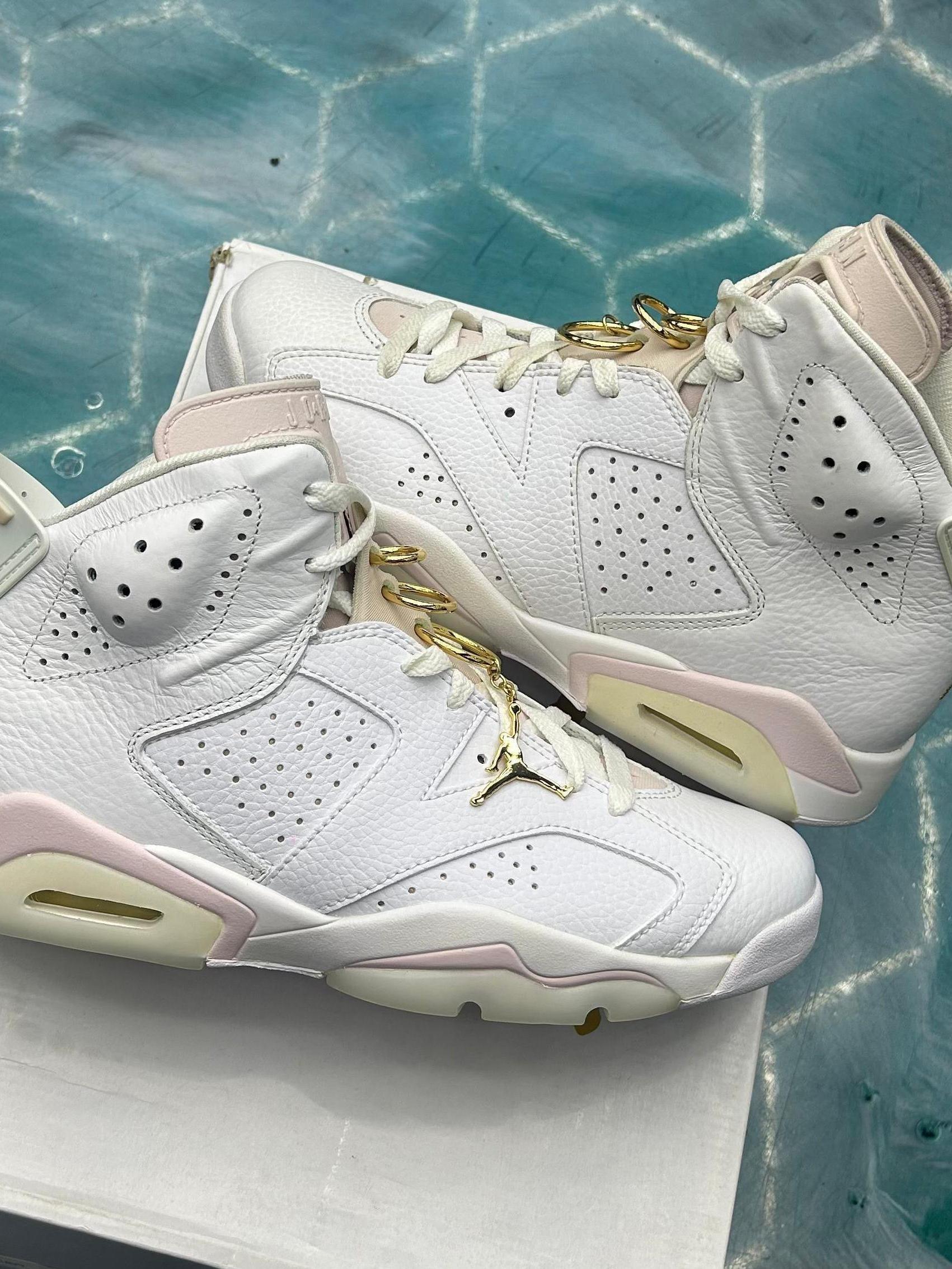 JORDAN 6 RETRO GOLD HOOPS (WOMENS) PRE OWNED SIZE 9.5W/8M, white leather with pink accents and gold chain details.