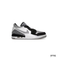 JORDAN LEGACY 312 LOW in light smoke grey, black, and white with elephant print and strap.