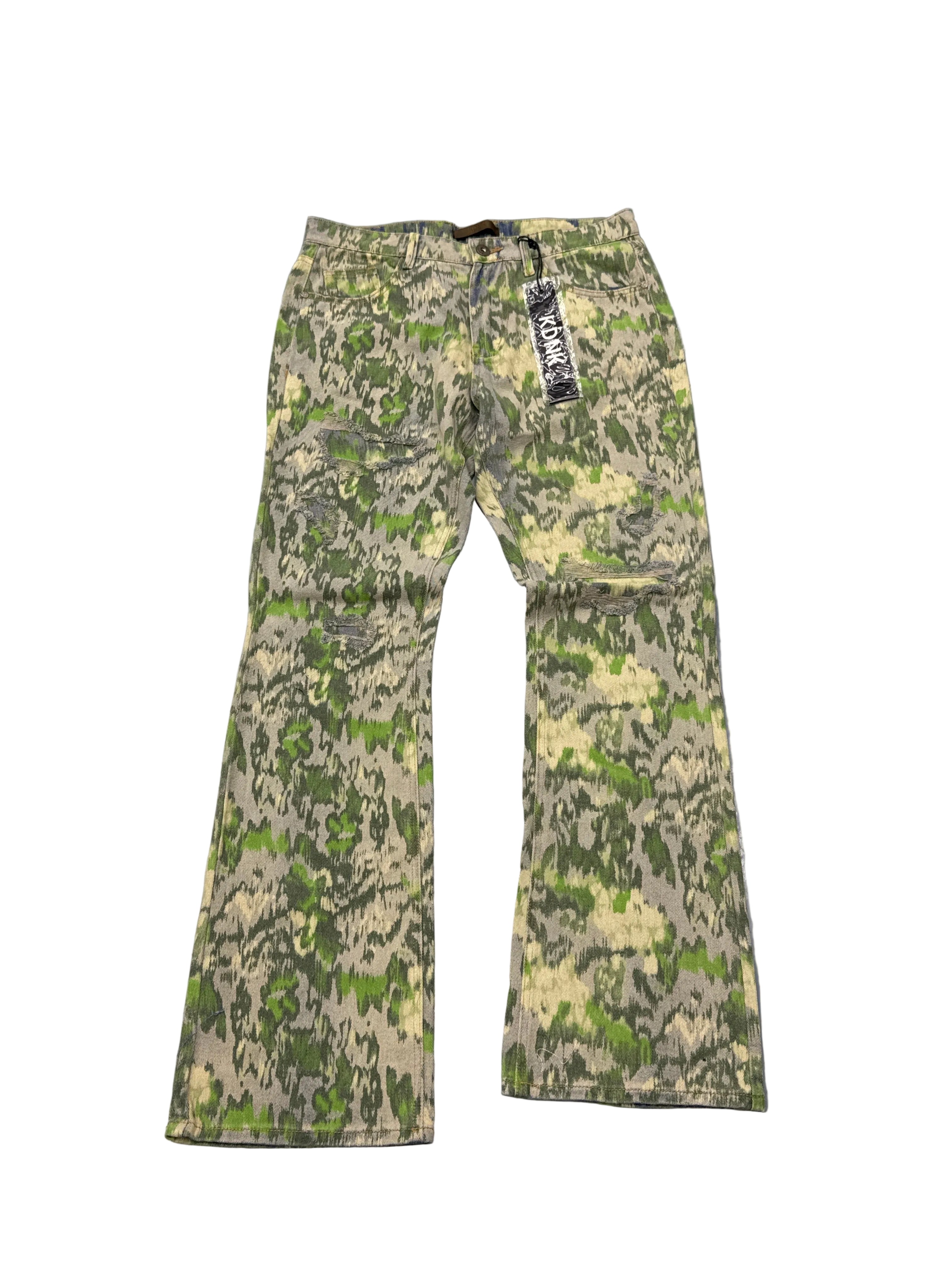 KDNK CAMO FOREST SLIM FLARE JEAN with distressed details and green, grey, and cream camouflage pattern.