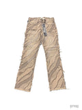KDNK KND4704 distressed beige denim jeans with ripped diagonal stripes and frayed hems.