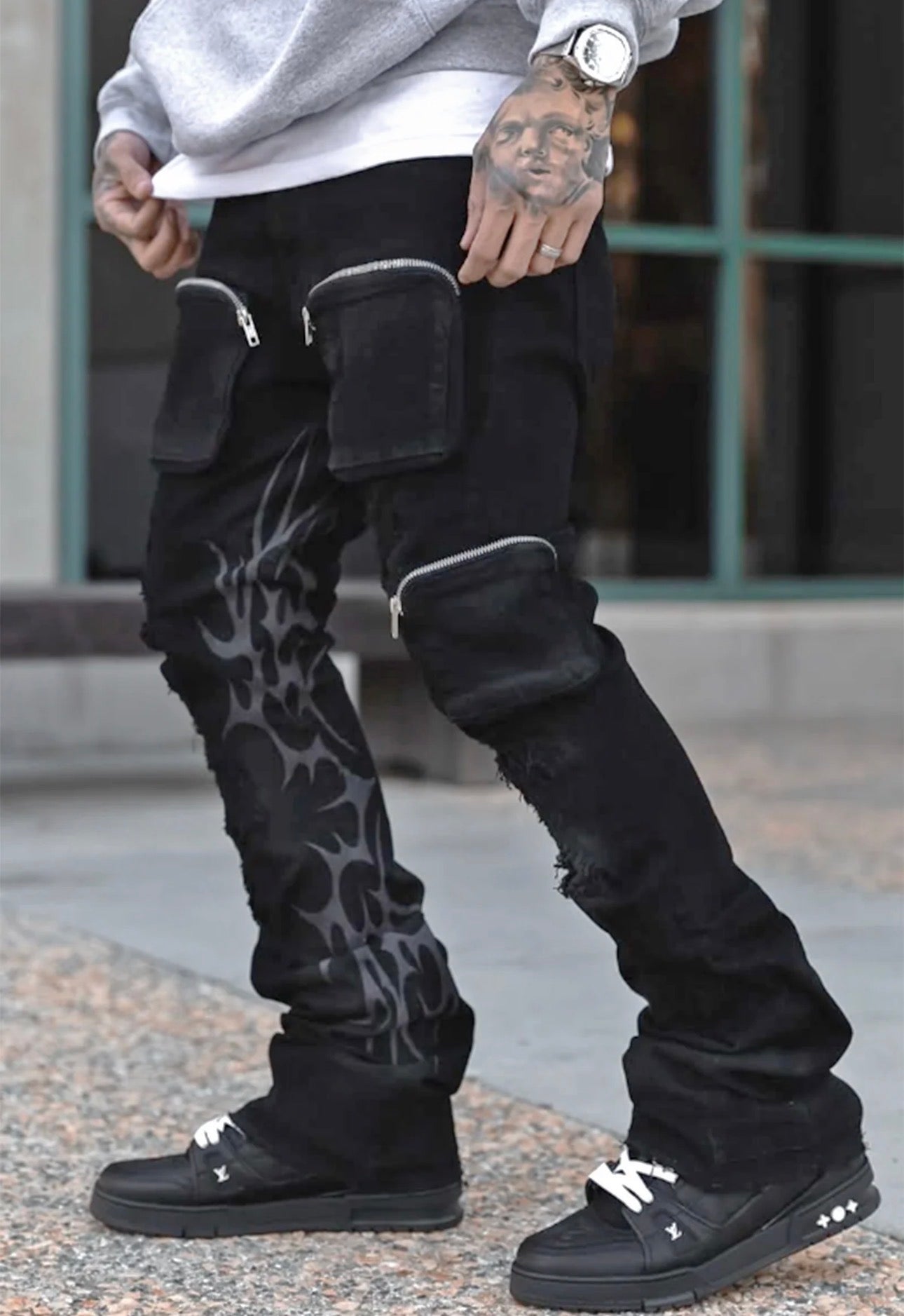 KDNK Sinister Skinny Flare jeans, black with grey flame print, cargo pockets, and distressed knees.