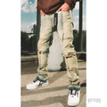 KDNK STACKED CUT light wash distressed denim jeans with stacked cuffs and black KDNK tag.