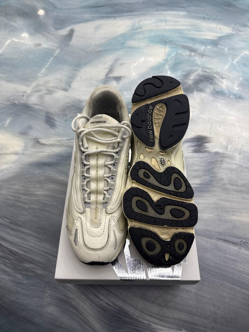 New Balance 1000 Aime Leon Dore white pre-owned size 10.5 sneakers, top and sole view.