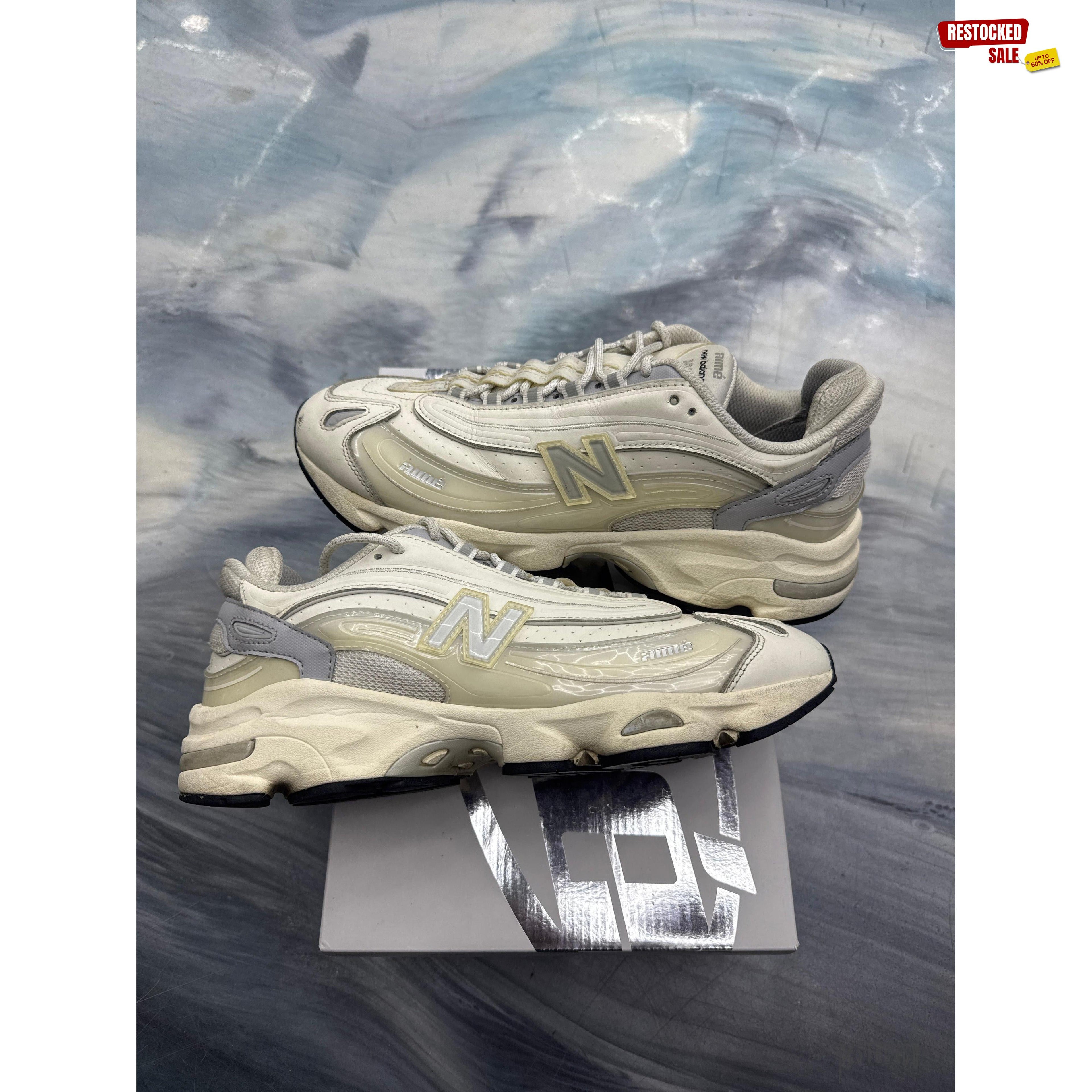 Pre-owned New Balance 1000 Aime Leon Dore white sneakers, size 10.5, with mesh and leather overlays.
