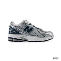 New Balance 1906R GS white, silver, and green sneaker with mesh and metallic overlays.