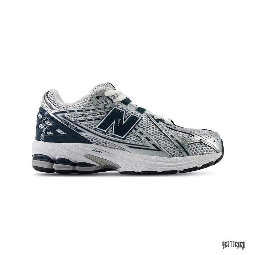 New Balance 1906R GS white, silver, and green sneaker with mesh and metallic overlays.