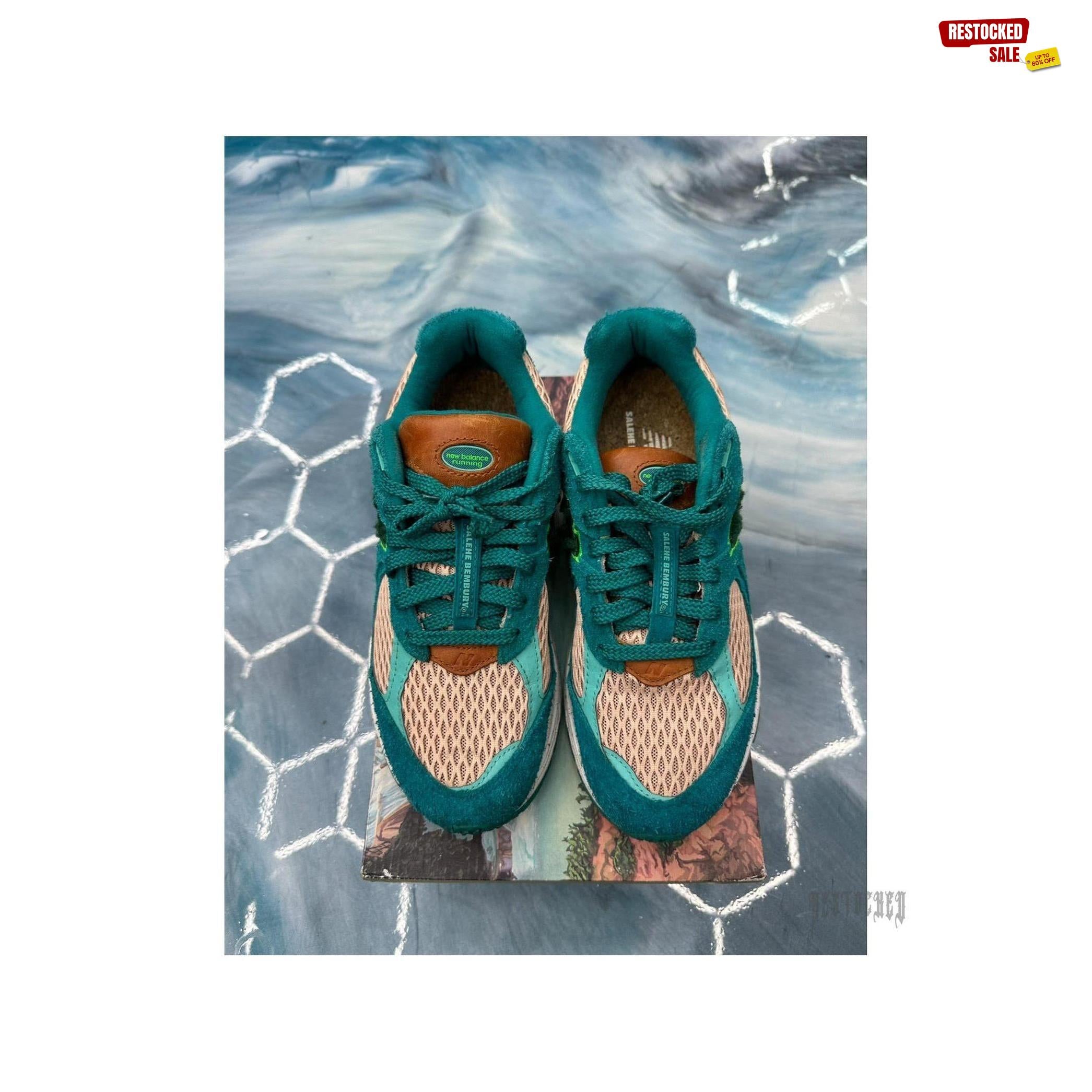 New Balance 2002R Salehe Bembury "Water Be The Guide" sneakers, size 8.5, with teal suede, peach mesh, and brown leather accents.
