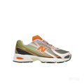 New Balance 740 Concepts Saignée sneaker with olive green gradient mesh, orange accents, and ABZORB midsole.