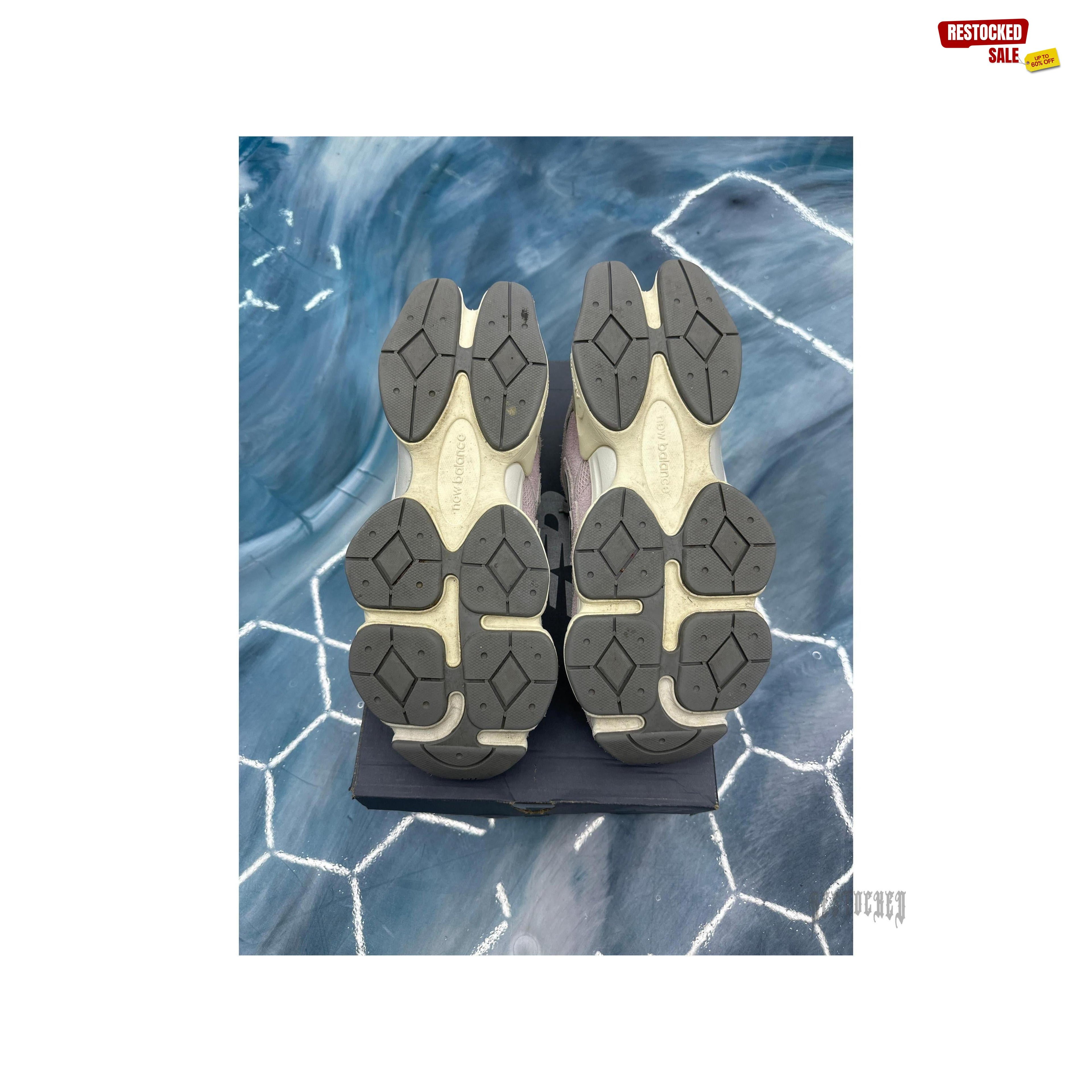 New Balance 9060 December Sky pre-owned sneakers, size 12, showing gray and off-white outsoles.