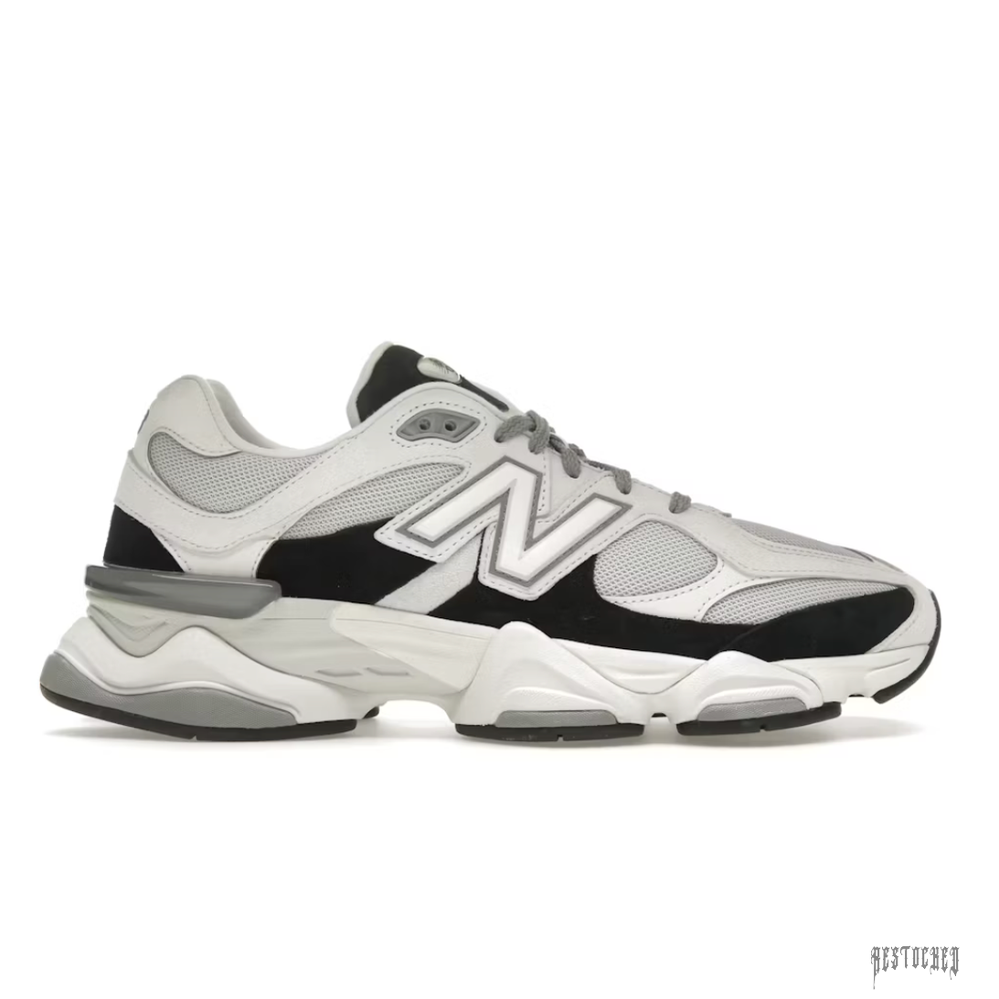 New Balance 9060 Grey Jet Black sneaker with mesh and suede accents, chunky white and grey sole.