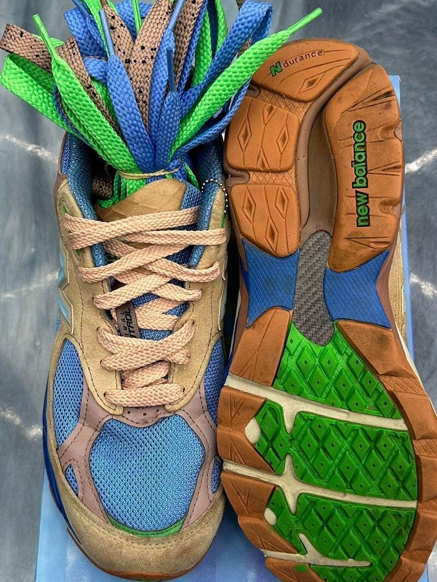 New Balance 990v3 Joe Freshgoods "Outside Clothes" sneakers, tan suede, blue mesh, pink laces, with extra green and blue laces.