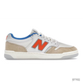 New Balance Numeric 480 Kith Madison Square Garden sneakers in tan, orange, and white.
