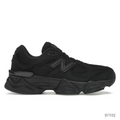 New Balance Triple Black 9060 (GS) sneaker, featuring a sleek all-black design with mesh and suede materials.